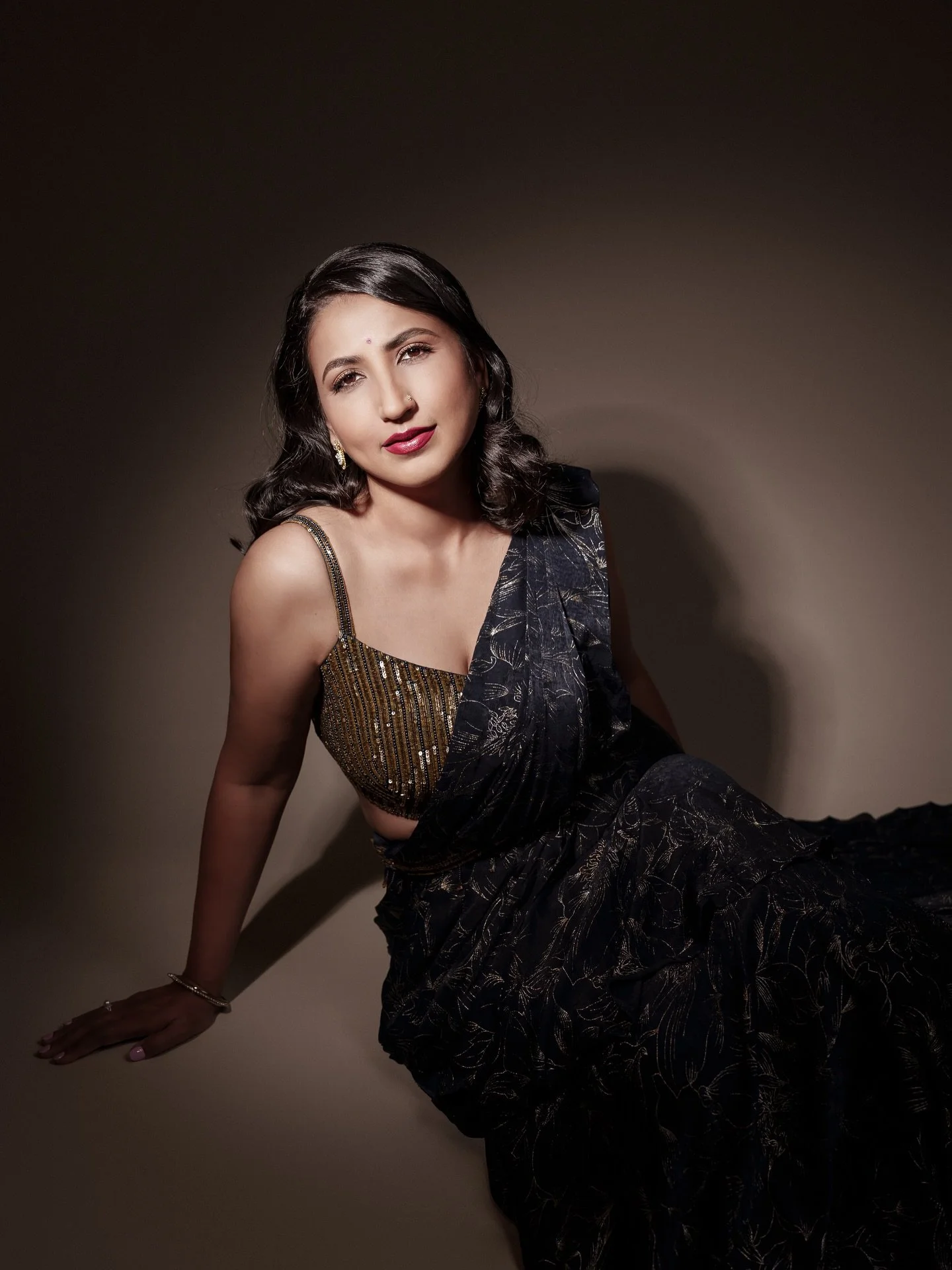 Pooja and I had similar vision for her studio photoshoot.

We wanted to weave her cultural background into the shoot and create modern portraits that honour her Indian heritage. Living abroad can slowly create distance from where you come from. I kno