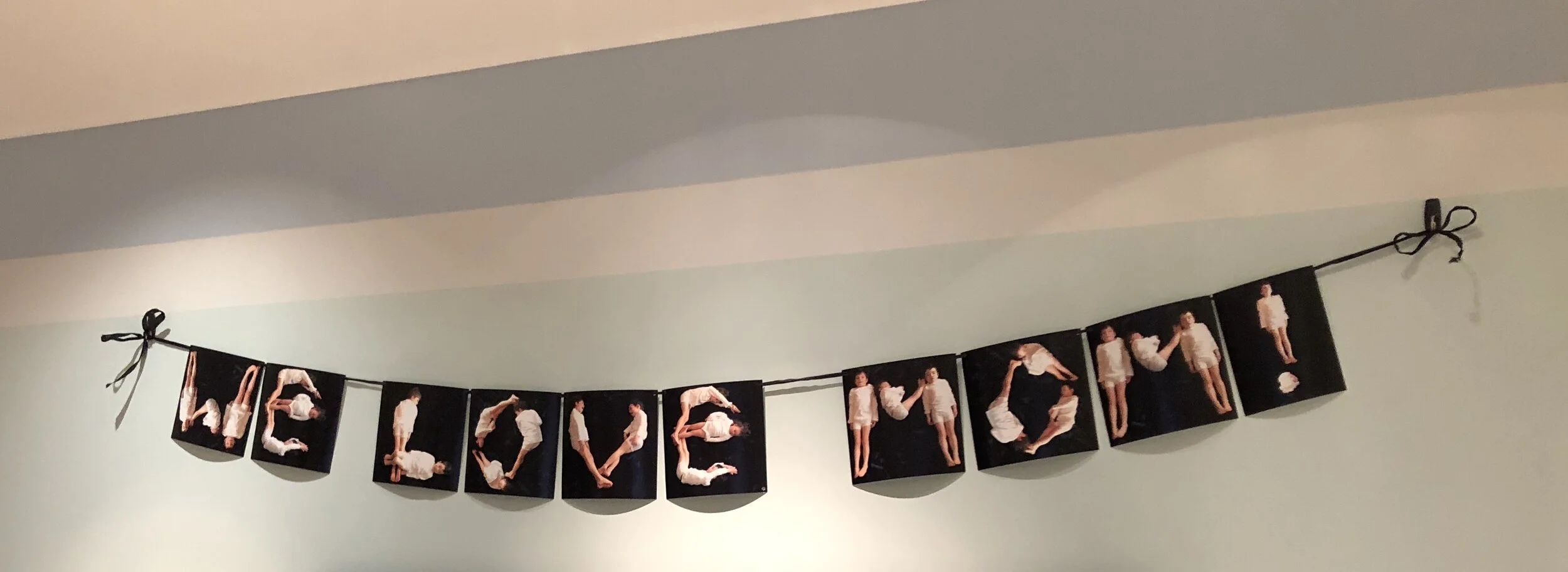 Mother's Day Banner using kids as letters.
