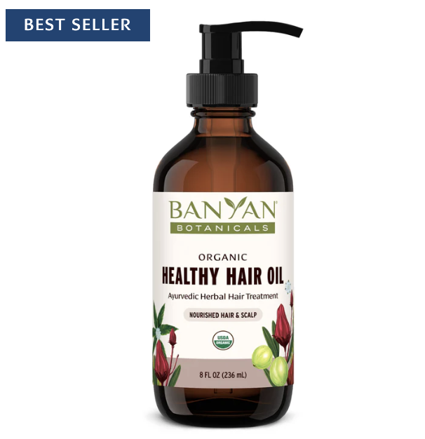 Dark-colored bottle of hair oil