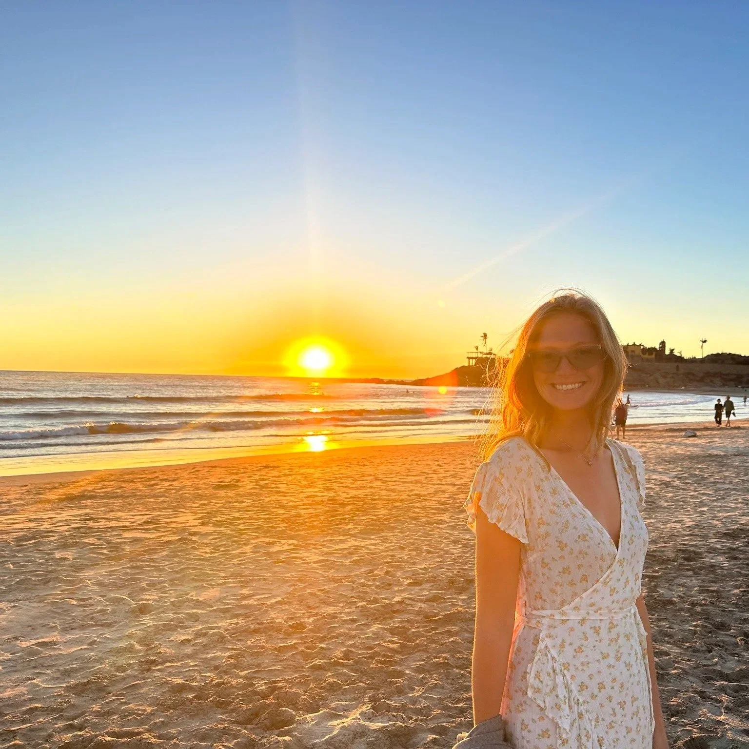 woman smiling on a beach