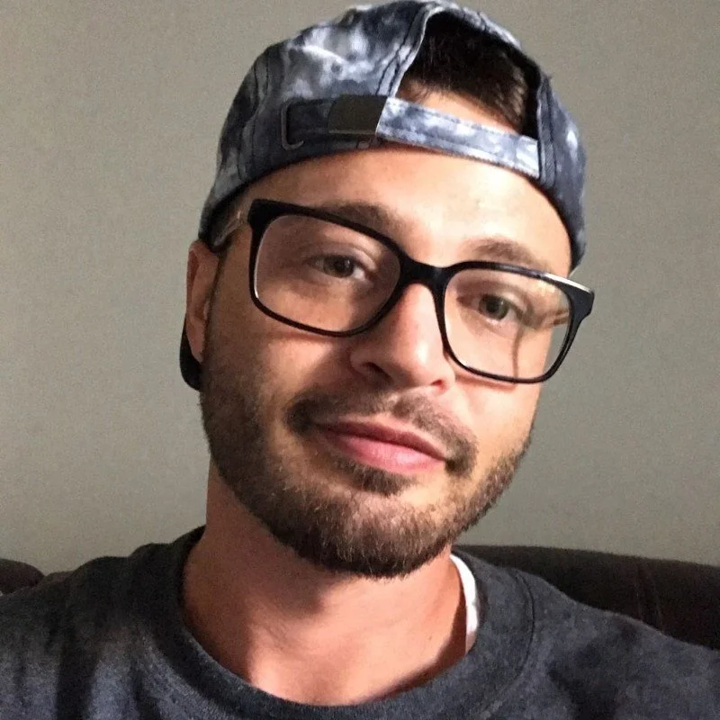 man in photo against a wall