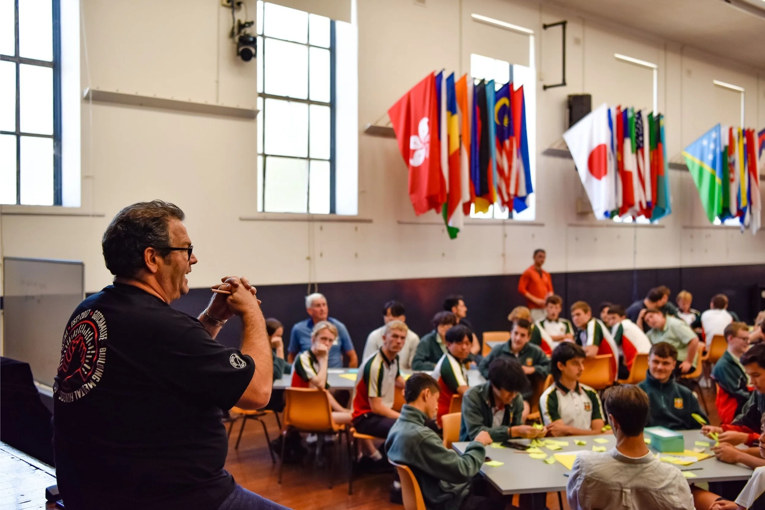 Gotcha4Life Founder, Gus Worland, presenting to a room full of students from South Sydney High School