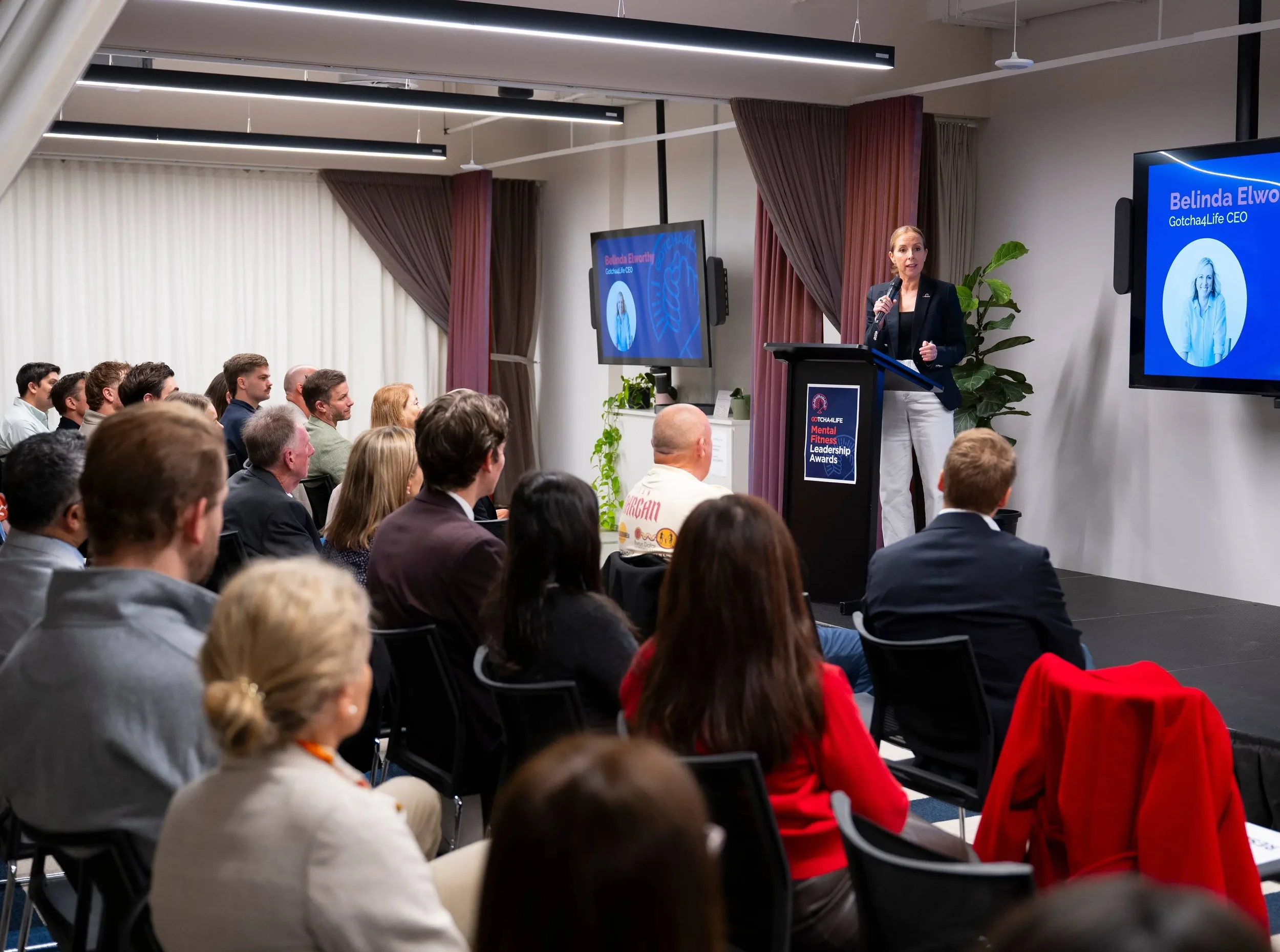 Gotcha4Life CEO, Belinda Elworthy, presenting at the Gotcha4Life Mental Fitness Leadership Awards.