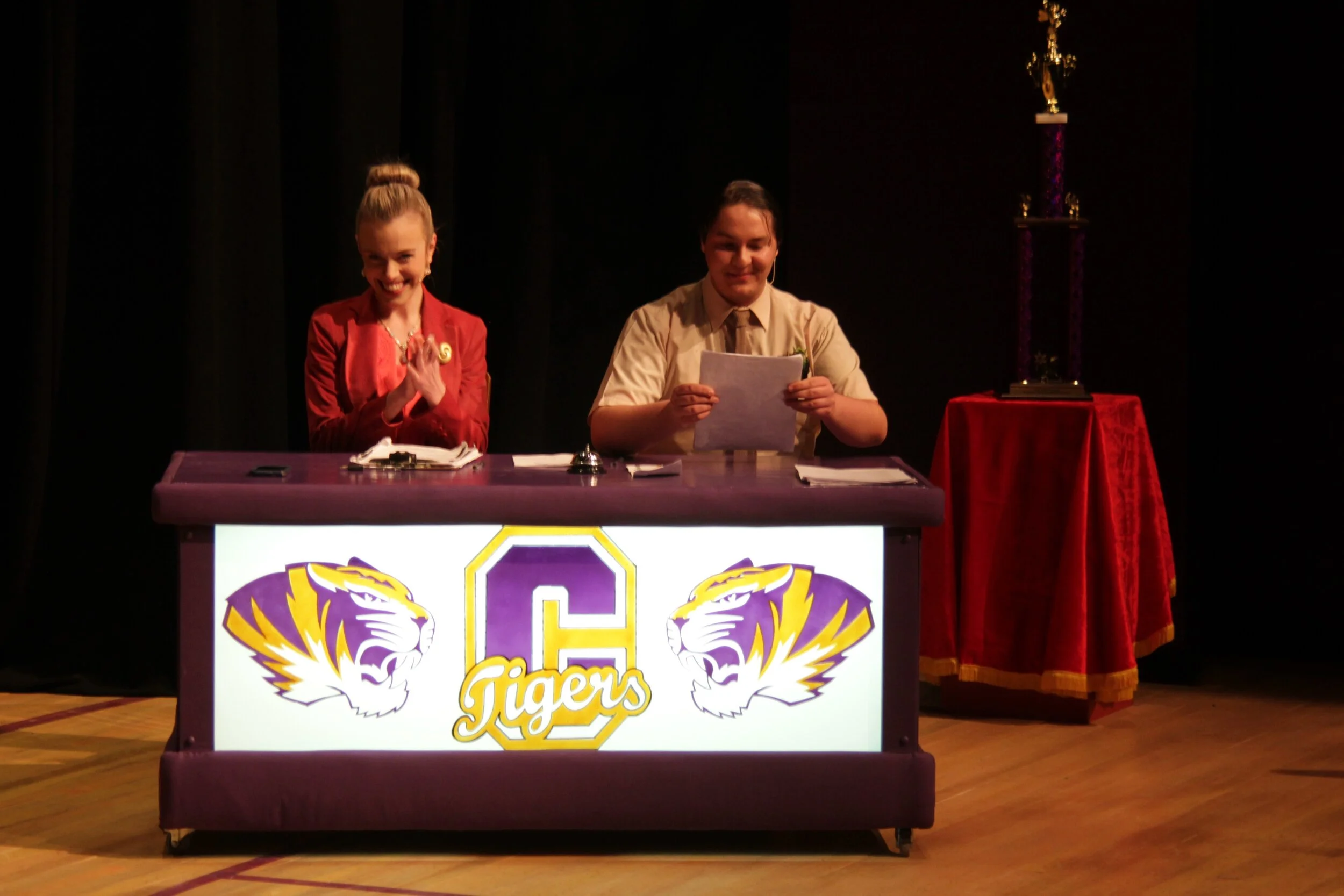 illuminated desk with Cortland HS logo and colors
