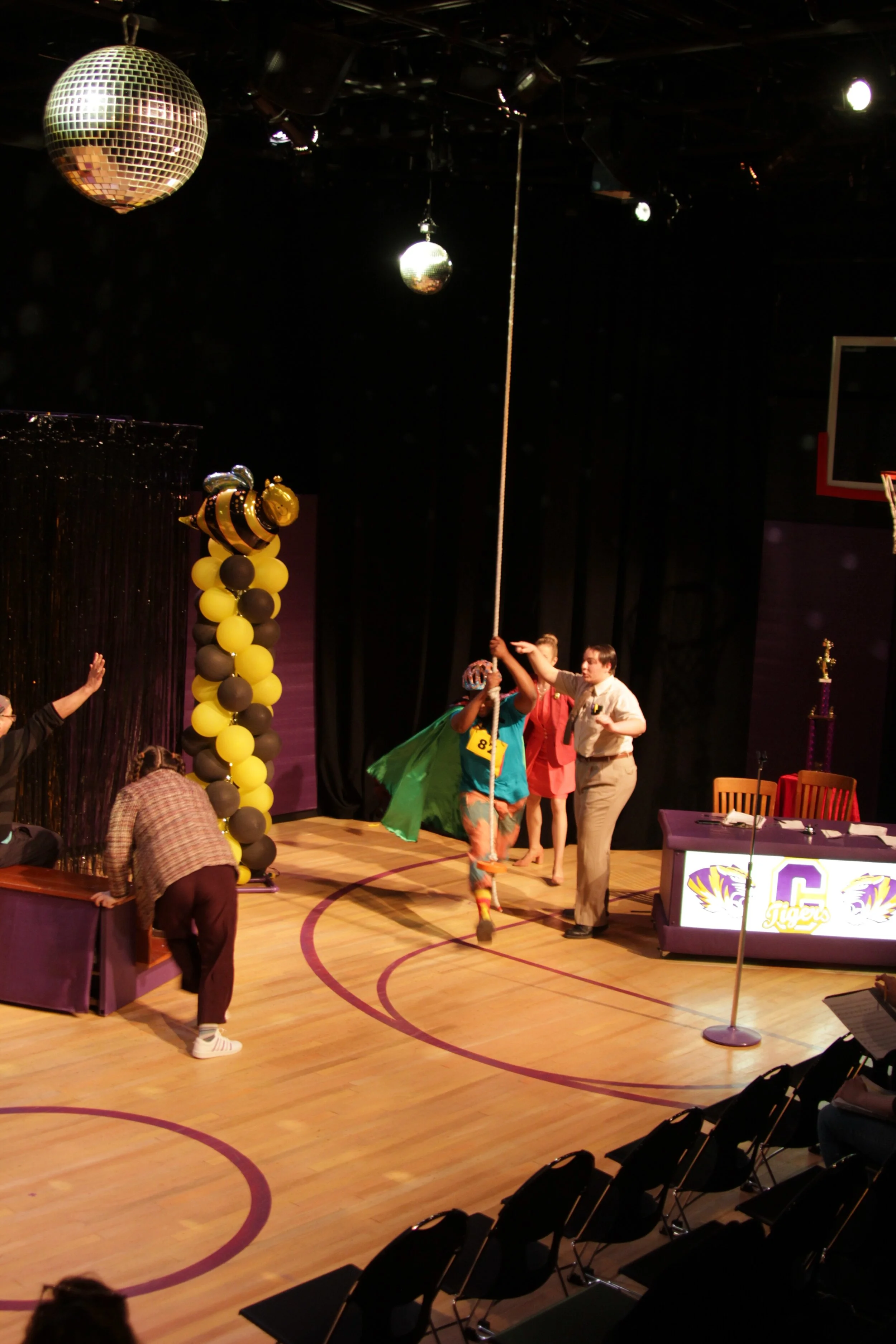 For one of the musical numbers we lowered in 7 mirror balls as a cast member swung frantically from a rope.