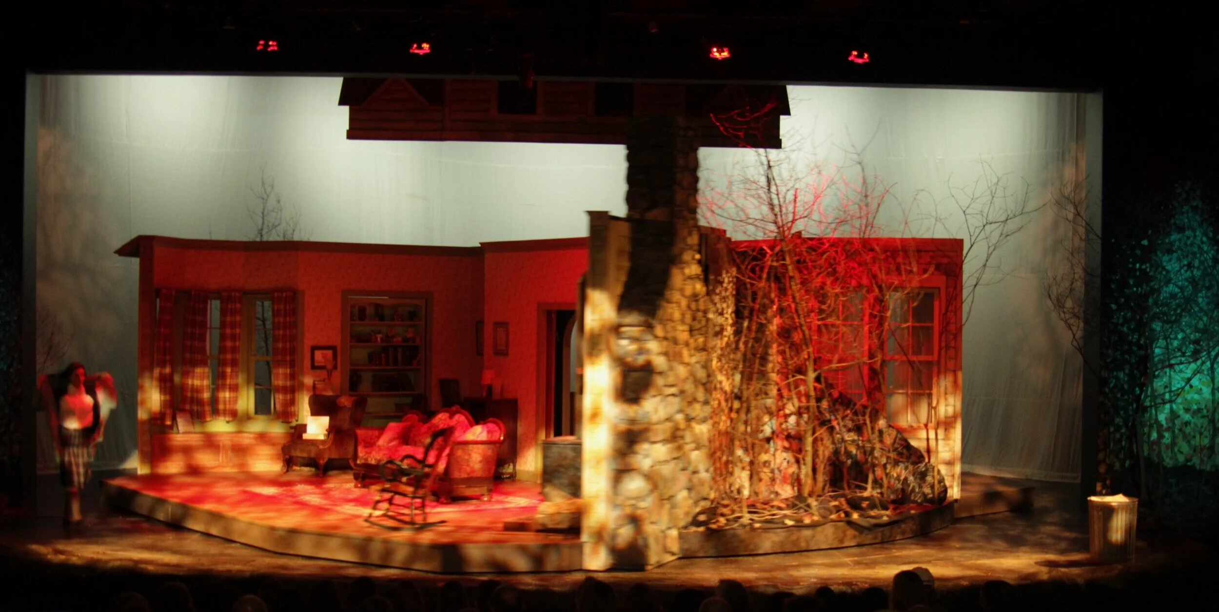 Transition through the woods.  As the rooms revolved Mary, the only one able to go beyond the set walls skips along to Grandmother's as the set turns.