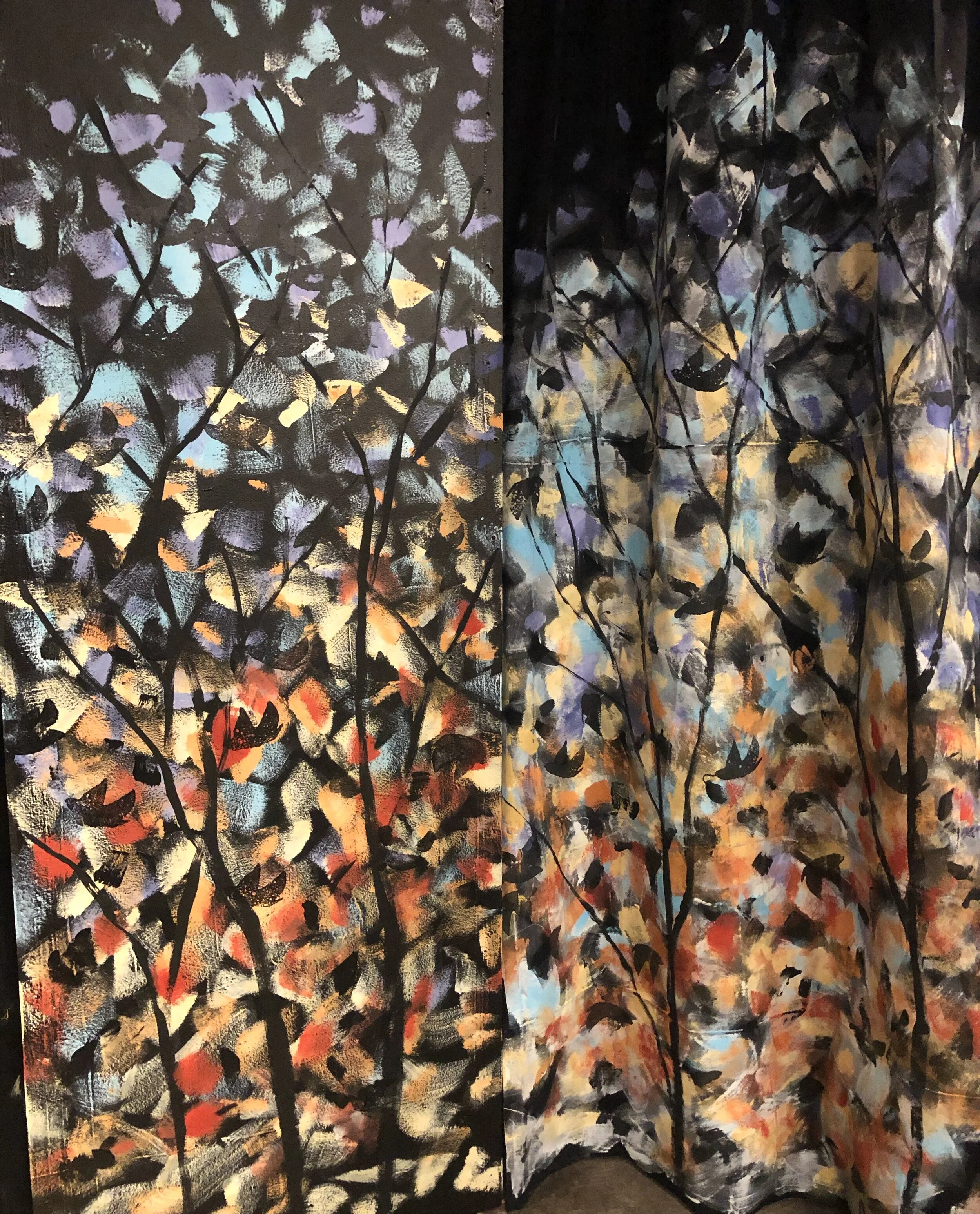 Painted wall and curtain.  The curtain hid the entrance into the stairway of the school