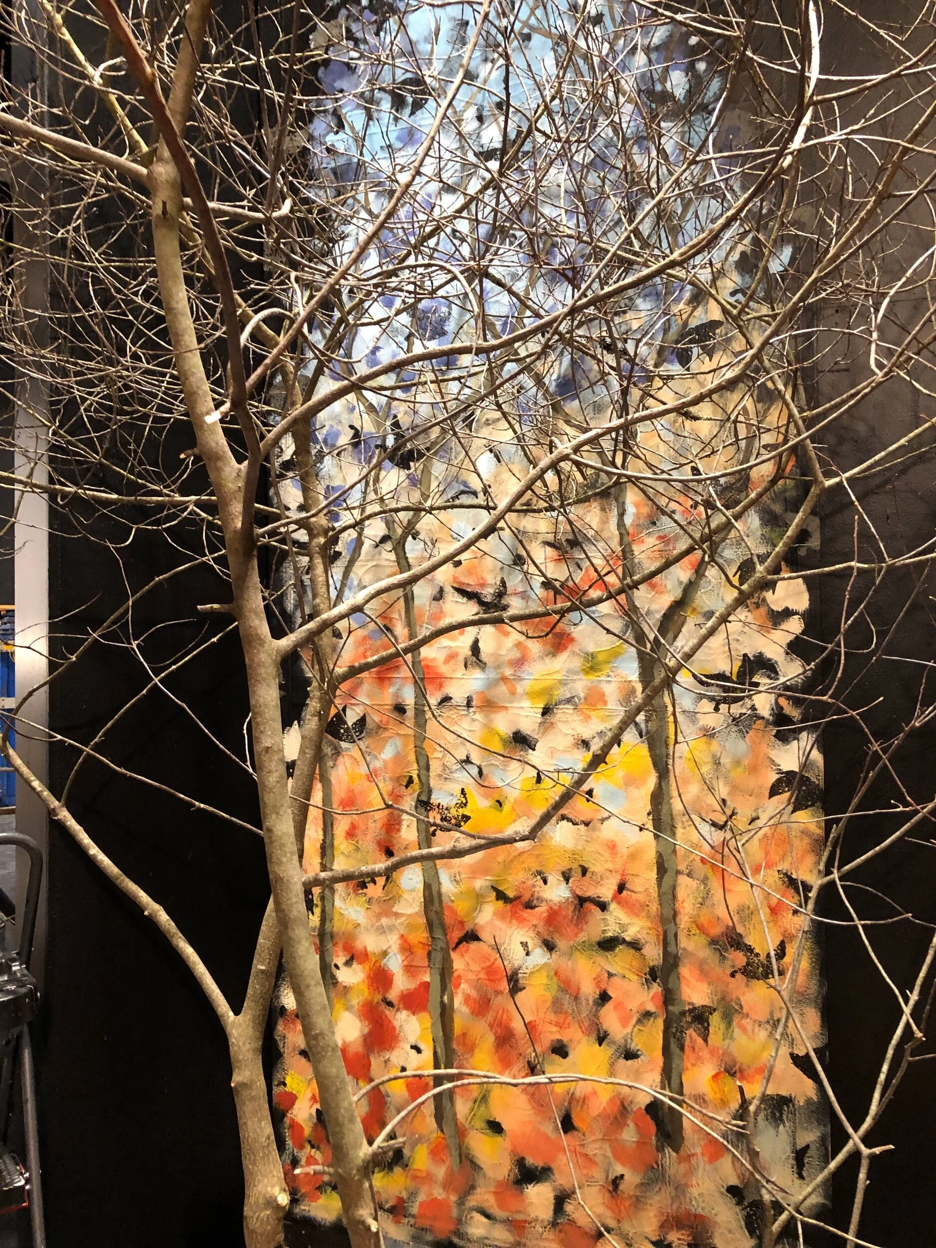 I cut and installed real trees to add to the wooded vignette.
