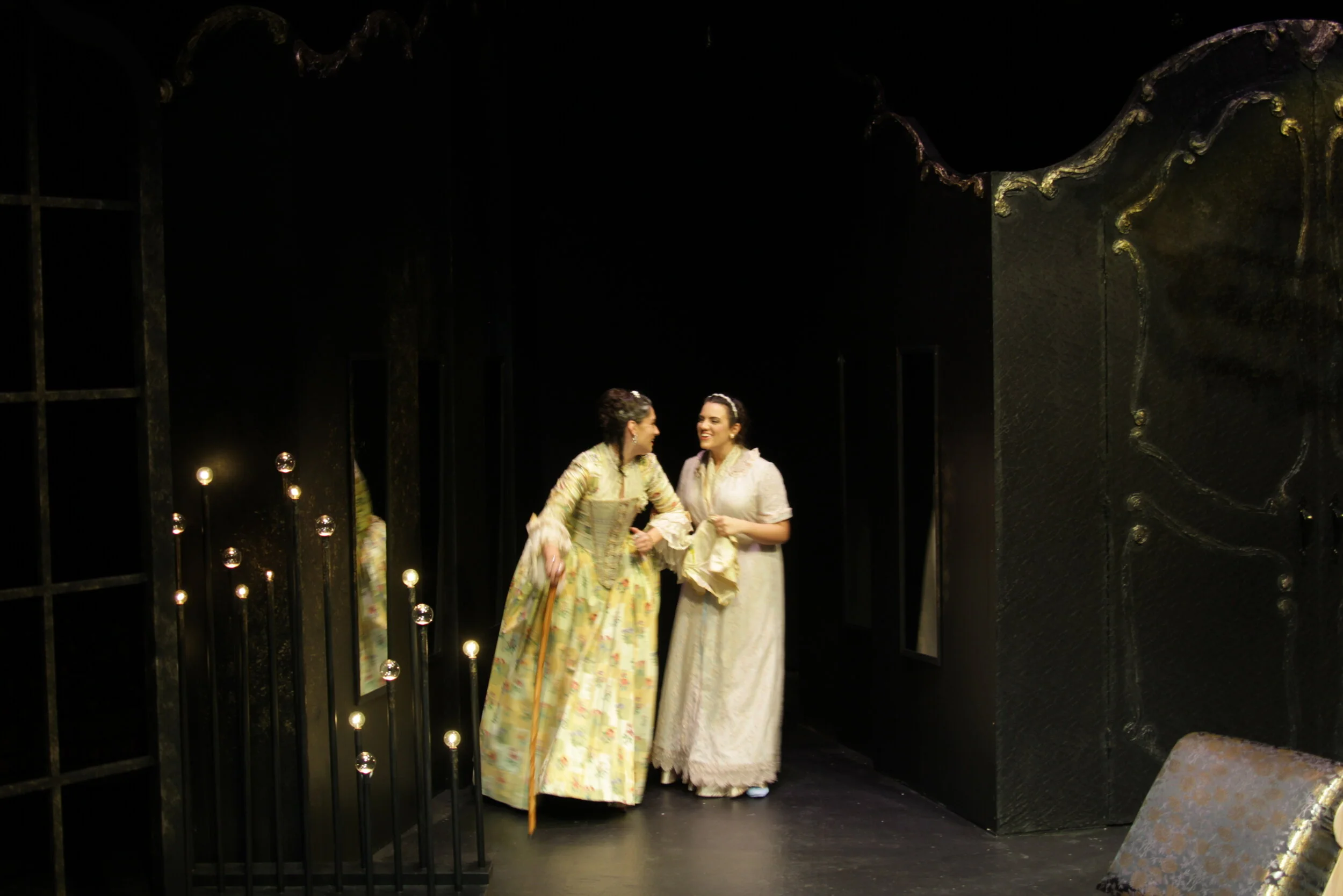 I installed mirrors, like those in Baroque hallways, in the upstage hallways so you could catch the reflections as the cast entered