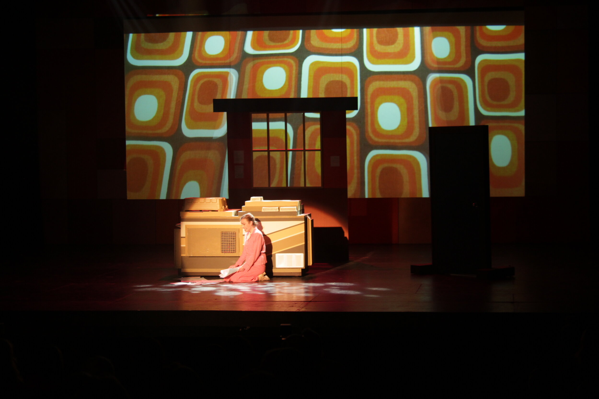 Xerox room.  in a dream sequence, Hart is fed to the Xerox machine and it consumes him.
