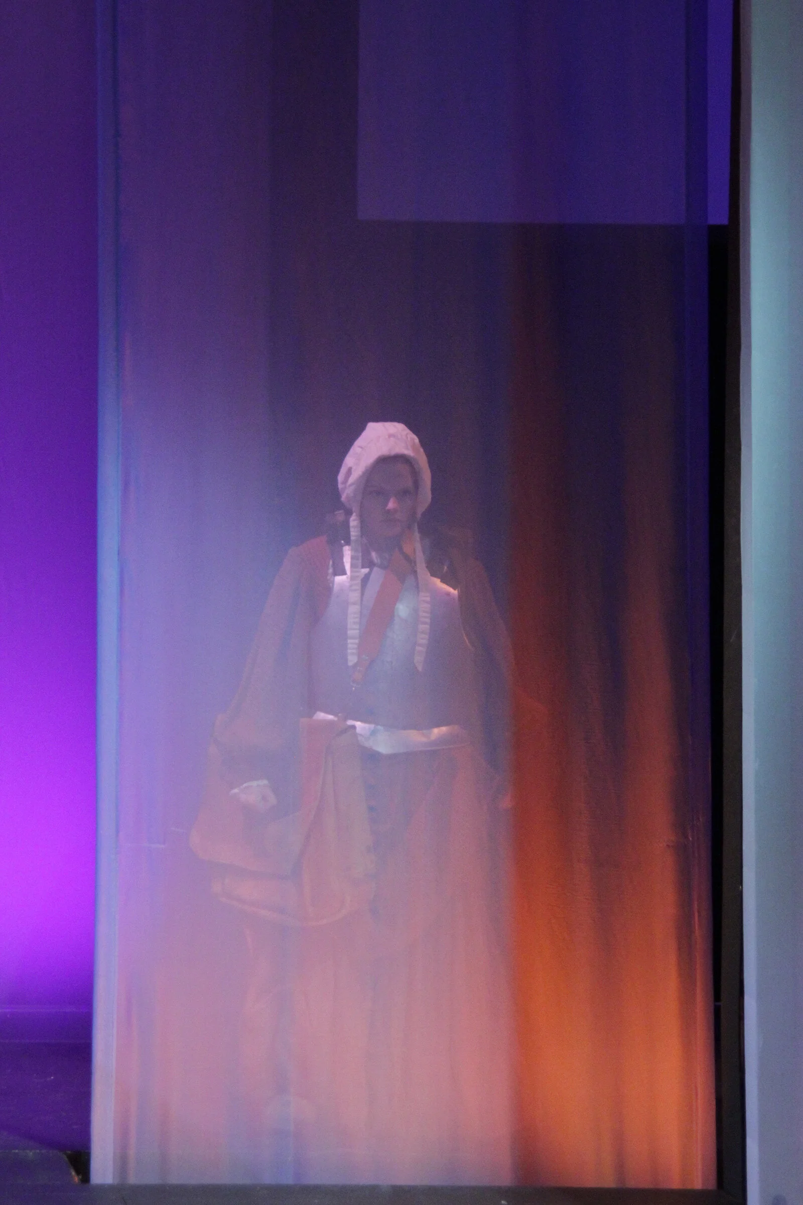 Prod photo:  Dull Gret bleeds through the fabric when she speaks
