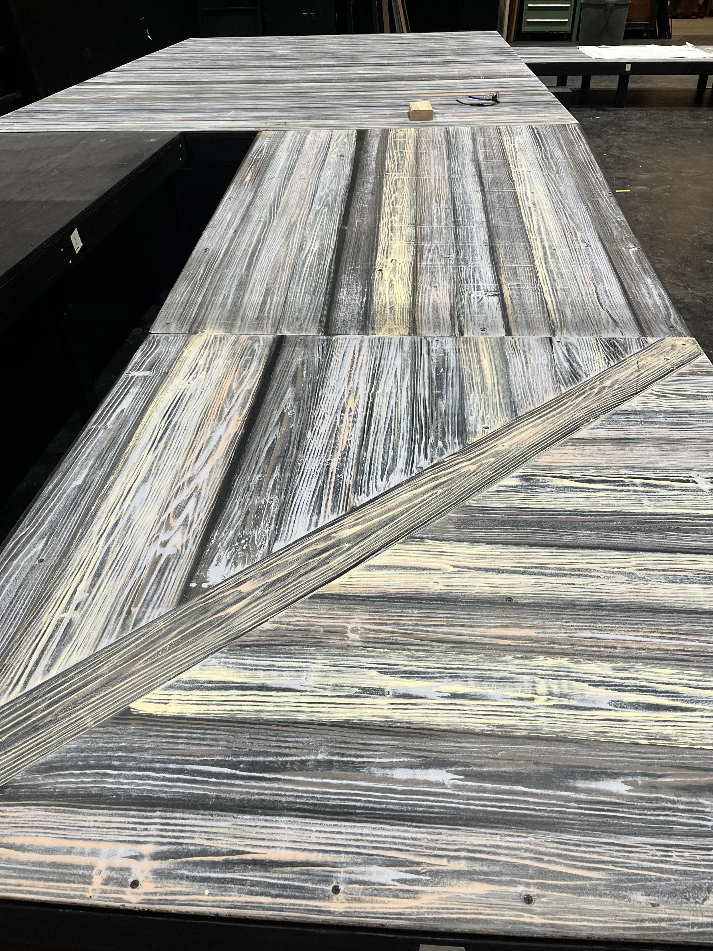 I painted the deck to resemble a weathered boardwalk where they first met