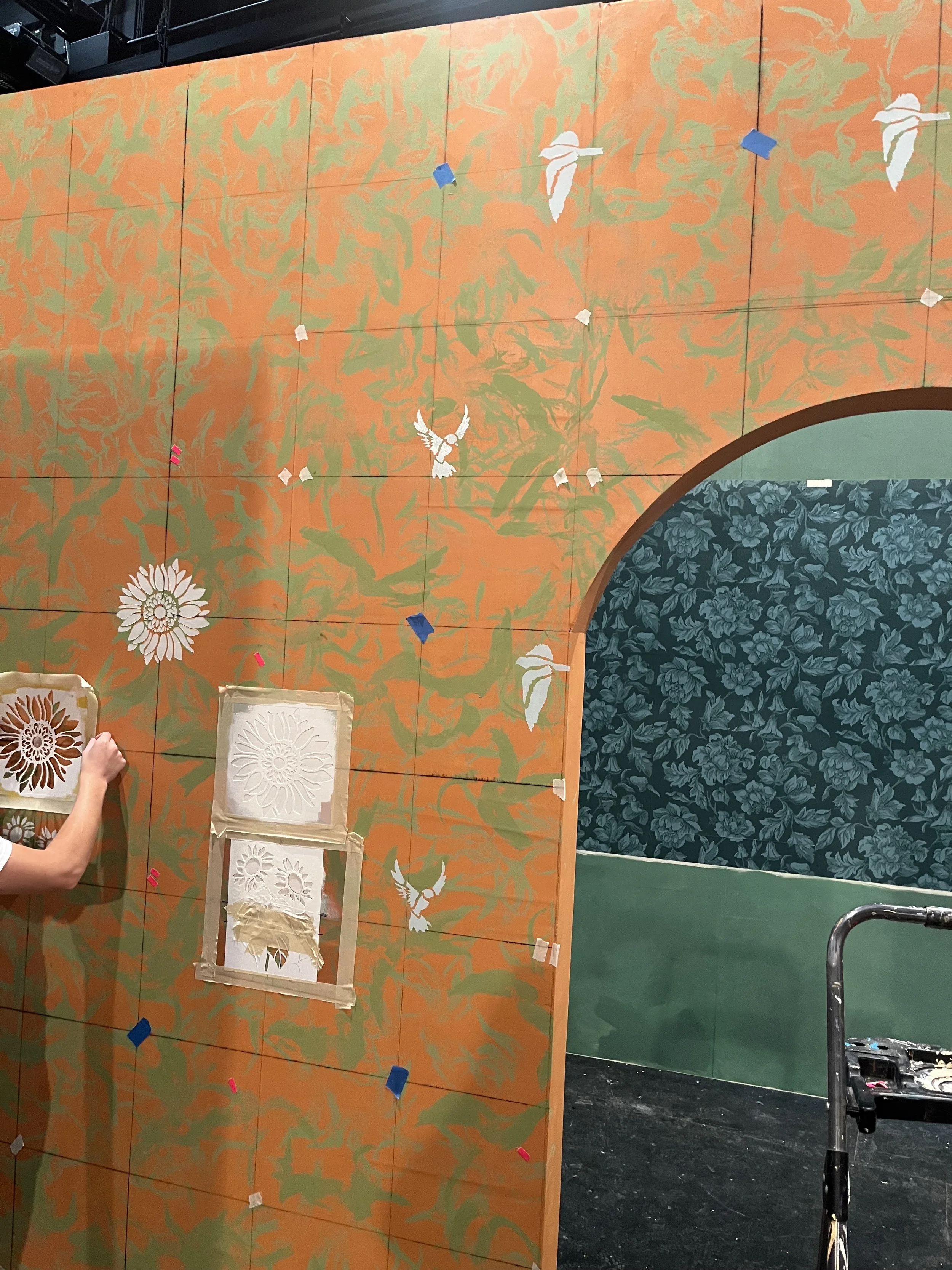 Stenciled sunflower wallpaper with stenciled birds