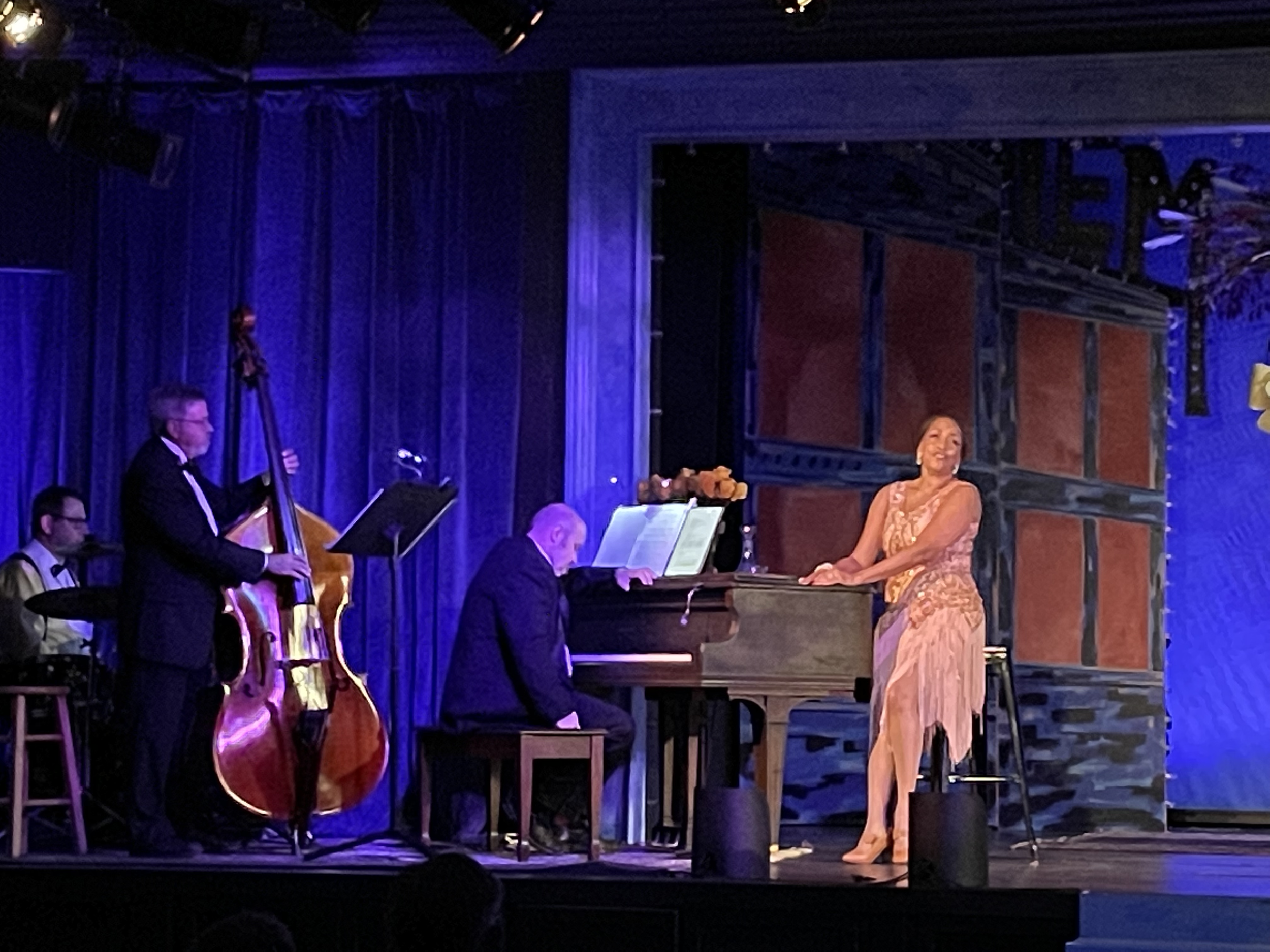 The performer interacted with the live band,  It was important for the performer and Director to keep us within the club atmosphere as she told her story