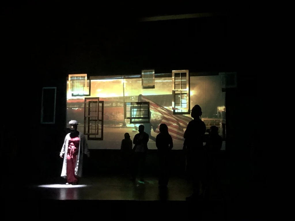 Projection was overlayed on the windows to show different cultural moments of change and activism