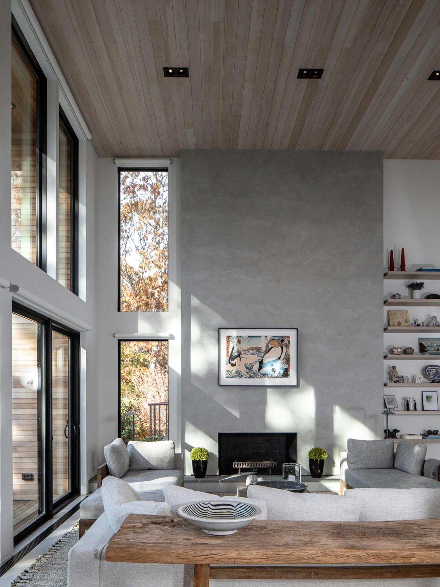 Revisiting one of our favorite living rooms.

We love the neutral textural material palette in this double height space which is made unexpectedly cozy by the warmth of the wood ceiling.

#moderninteriordesign 
#modernluxury 
#hamptonsrealestate 
#mo