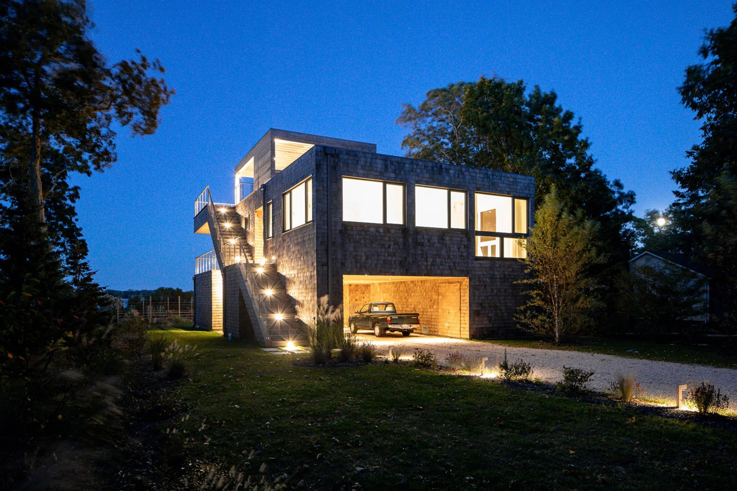 Concrete foundation boxes on helical piles with carport and flood vents, Bay Shore Road