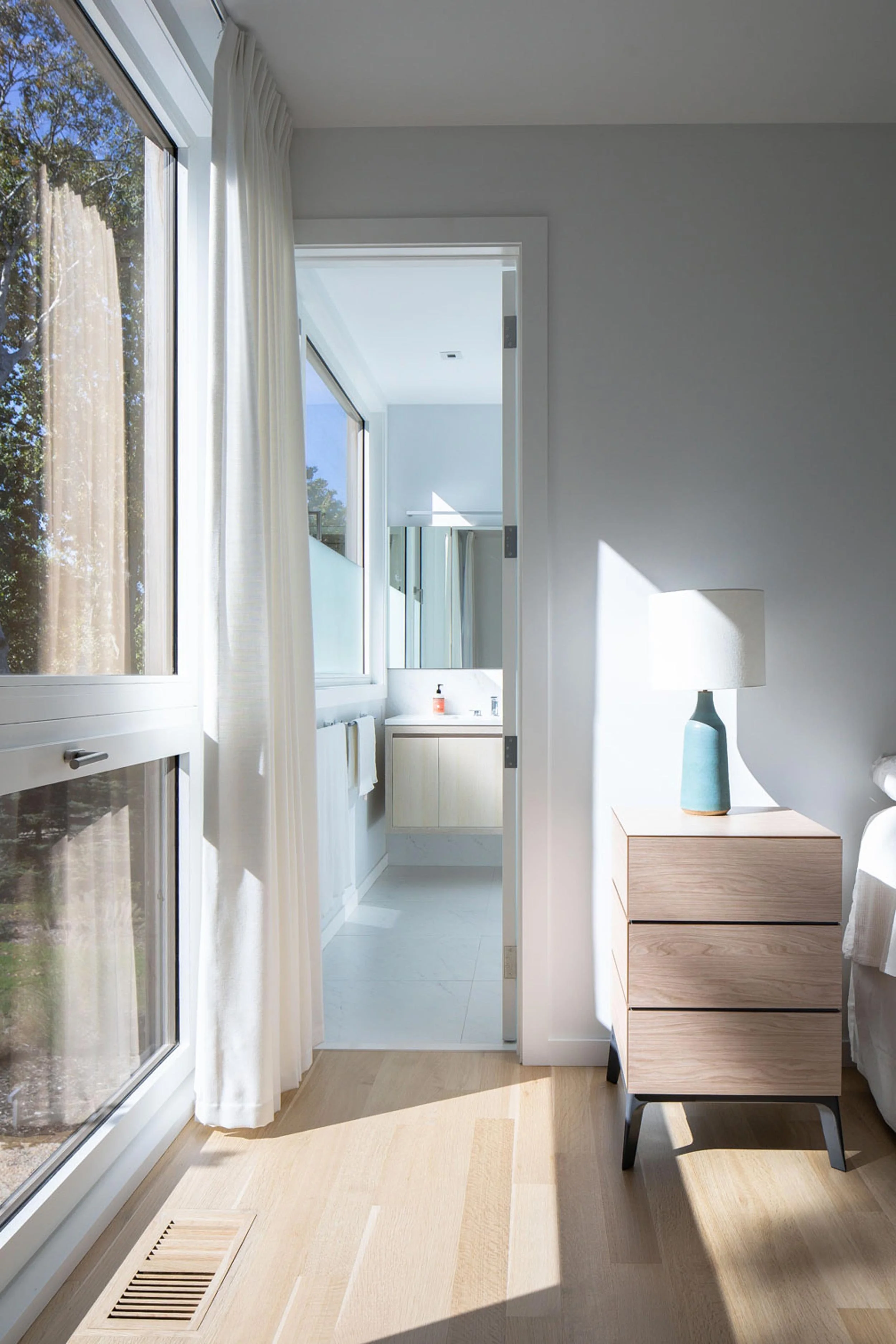 Coastal home with restrained material palette and European windows, North Fork Long Island