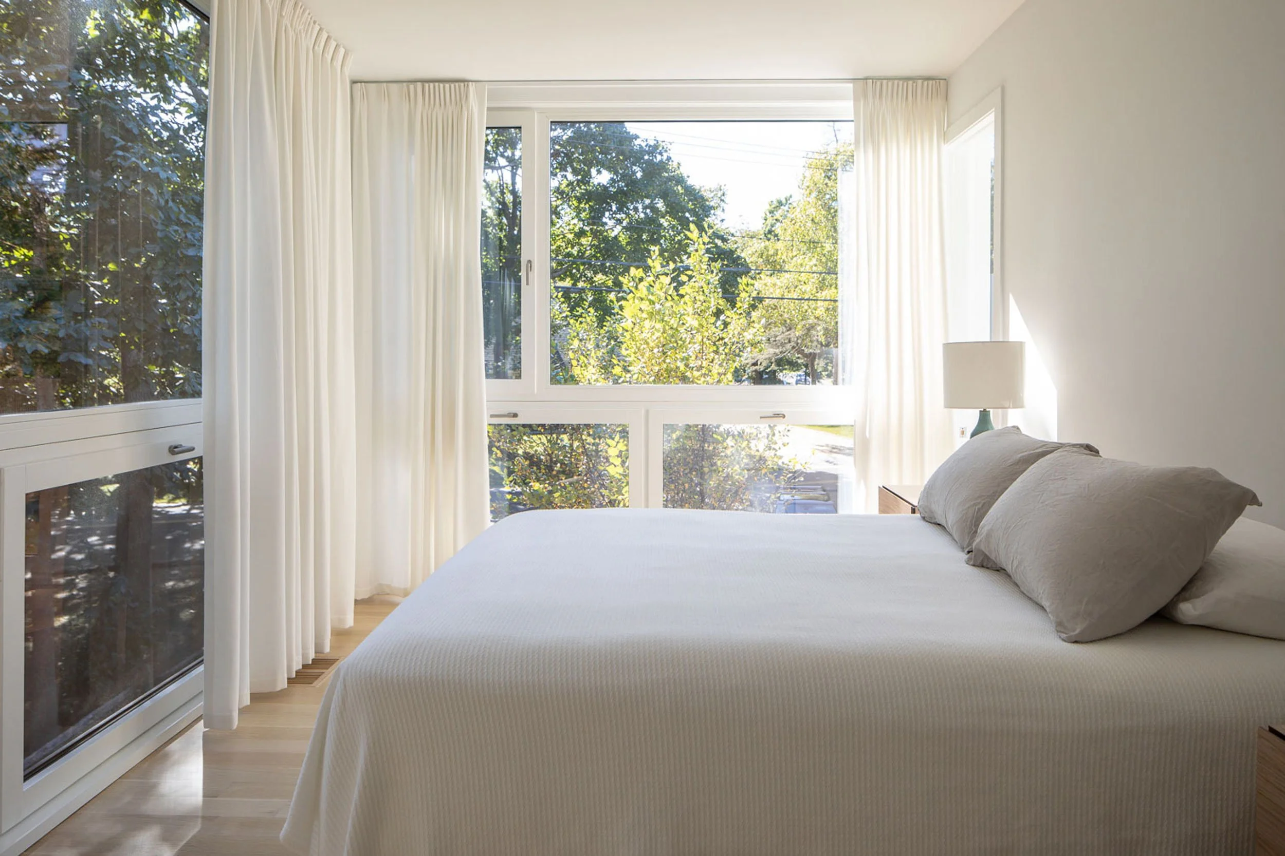 Modern bedroom with european windows, North Fork Long Island