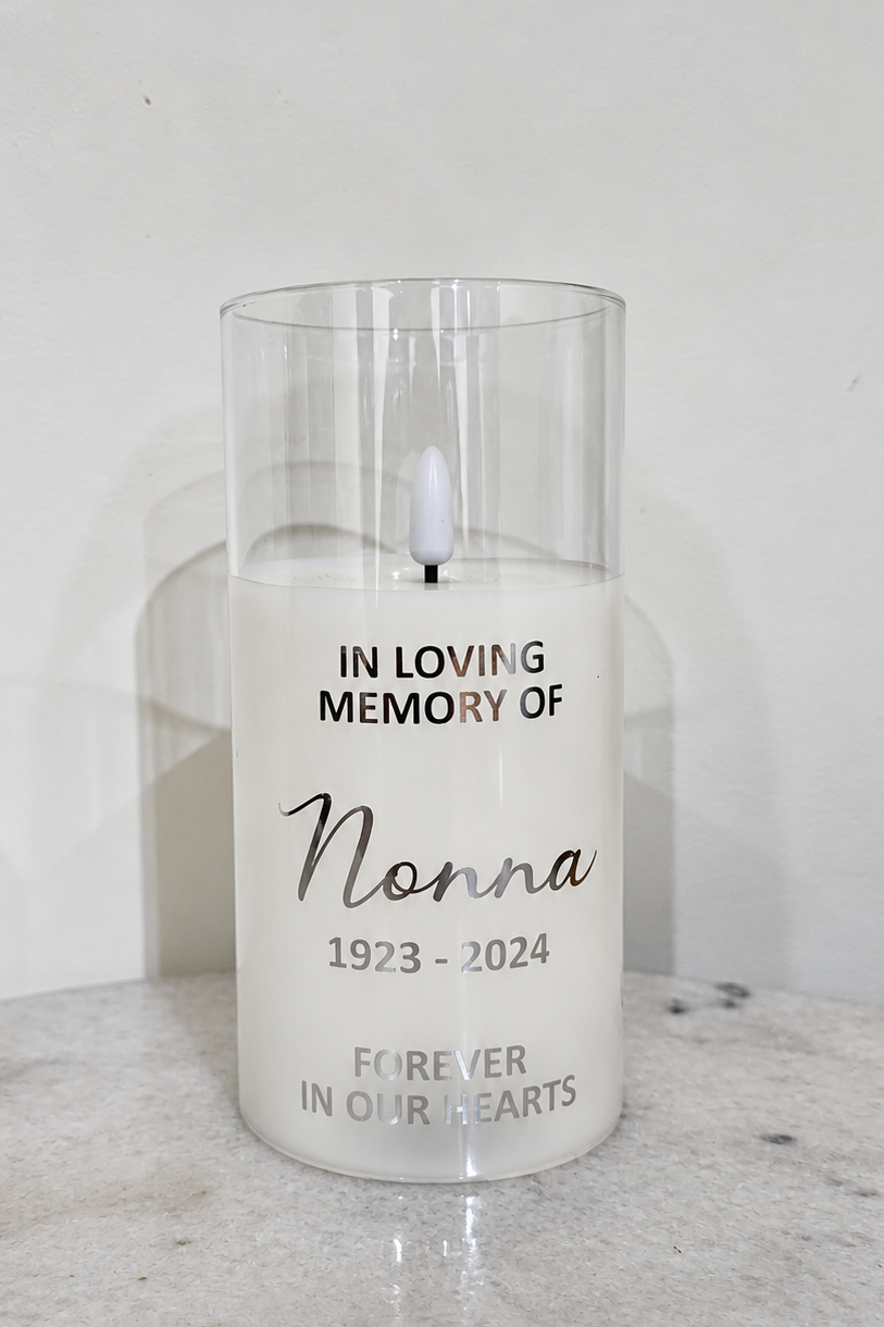 Illuminated LED memorial candle personalised with Nonna and 1923–2024, with “Forever in our hearts” lettering.