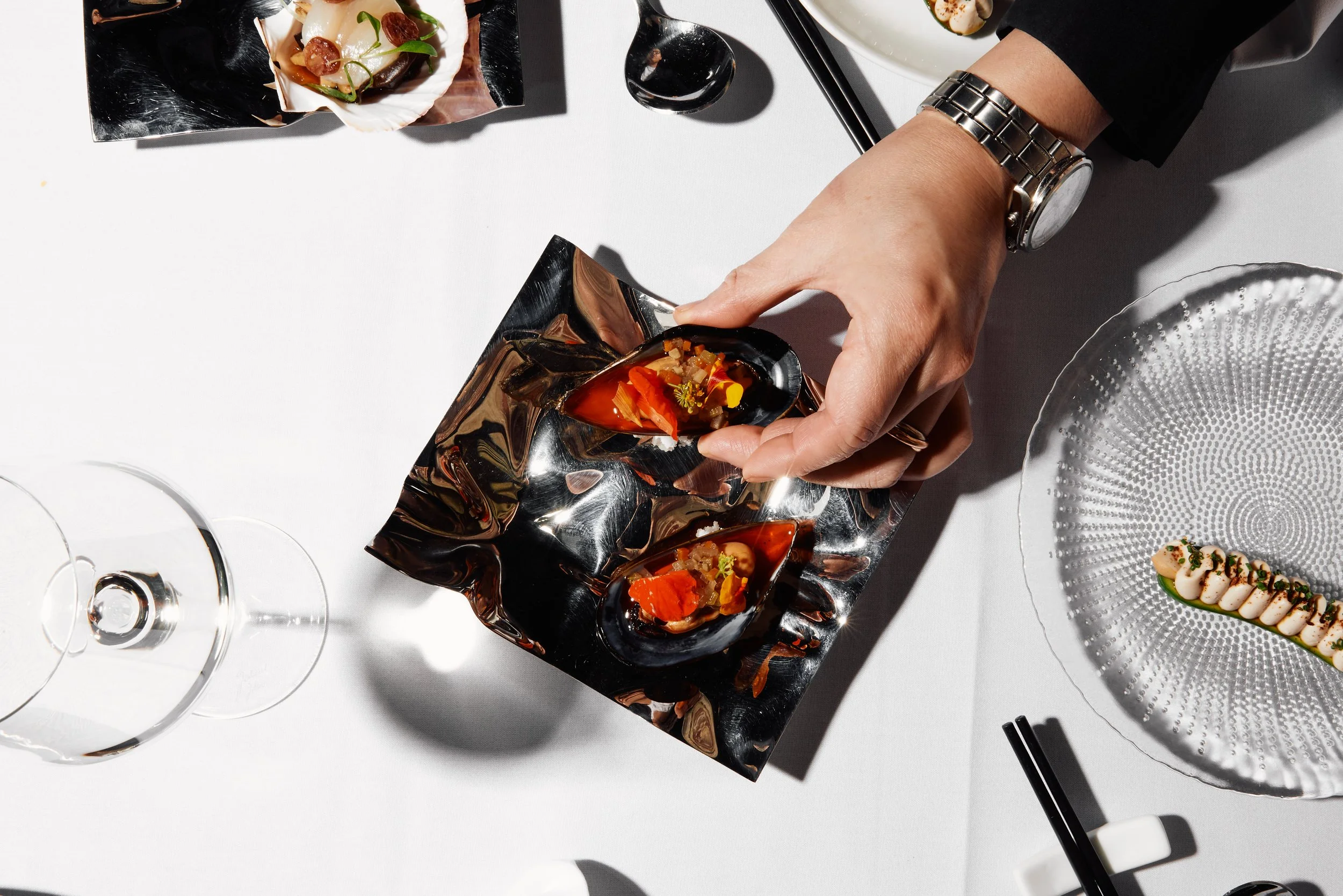 Pickled mussels hands landscape.jpg