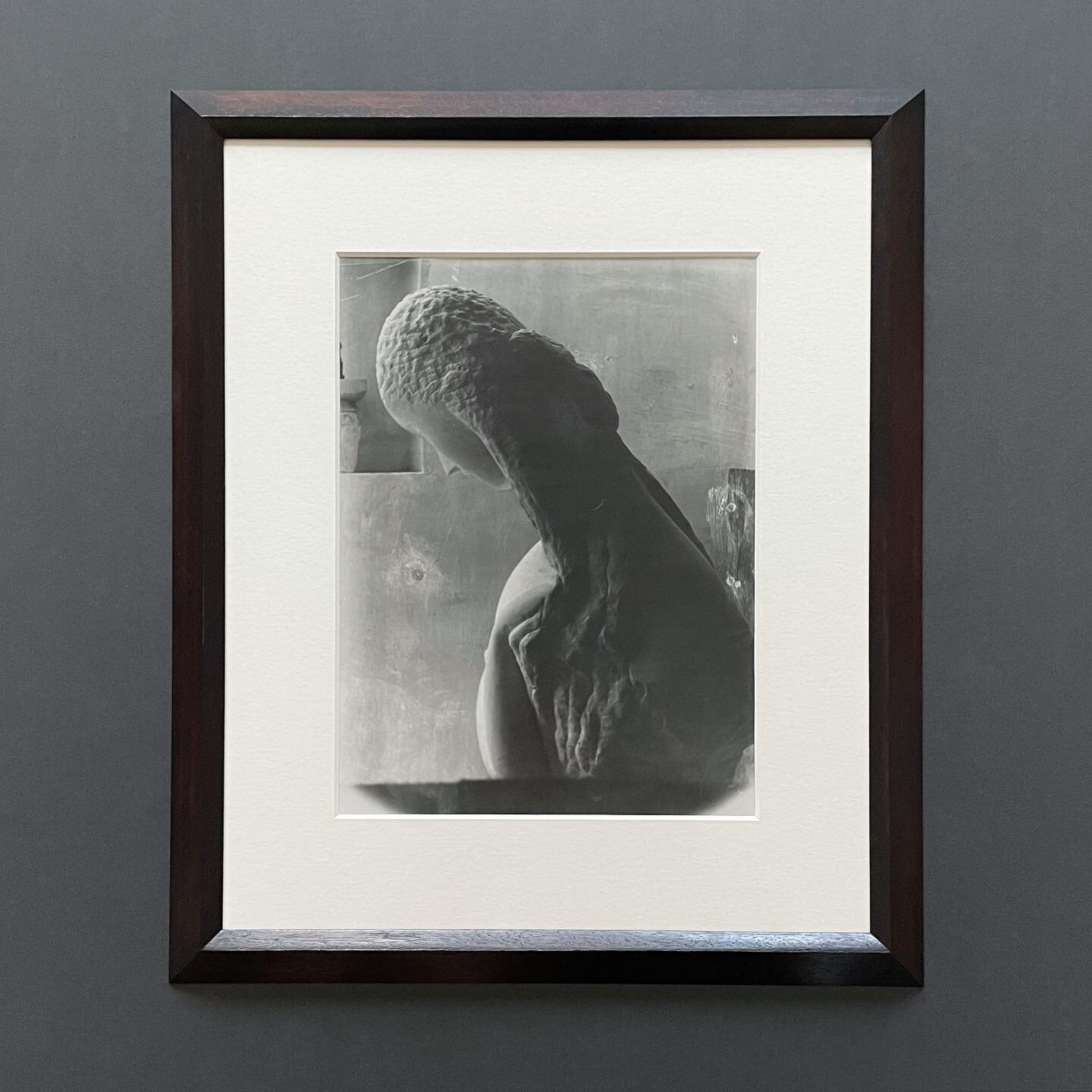 Photograph by #Br&acirc;ncuși 
Framed in a custom profile angled frame, stained dark brown, polished and waxed