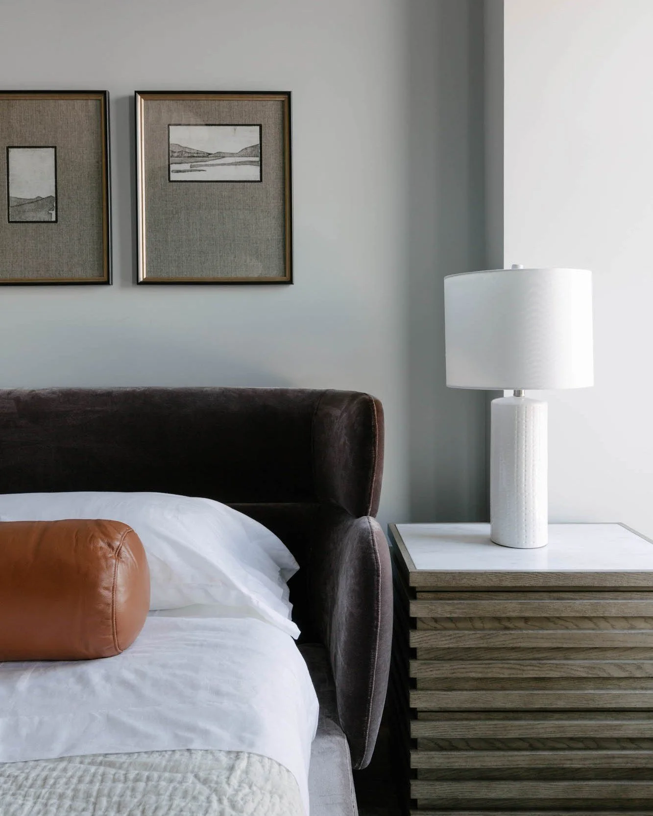The AD Digest posted about bolster pillows after sharing images of @jeffgoldblum home last week, reminding us that we have done this several times in our bedroom designs. 

Photos 1-4 are our bedroom designs. Cylindrical bolsters are a minimal, easy,