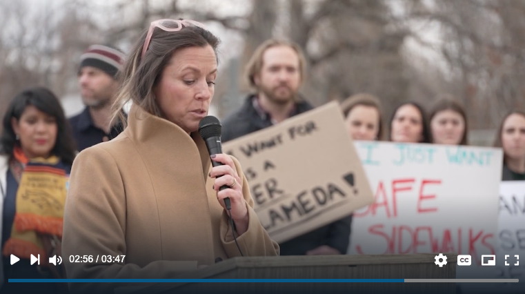 photo of woman speaking at WWPNA press conference