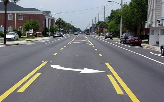 Example of a "Full Lane Repurposing"  (also called a 4 to 3-lane conversion)  Image: Federal Highway Administration