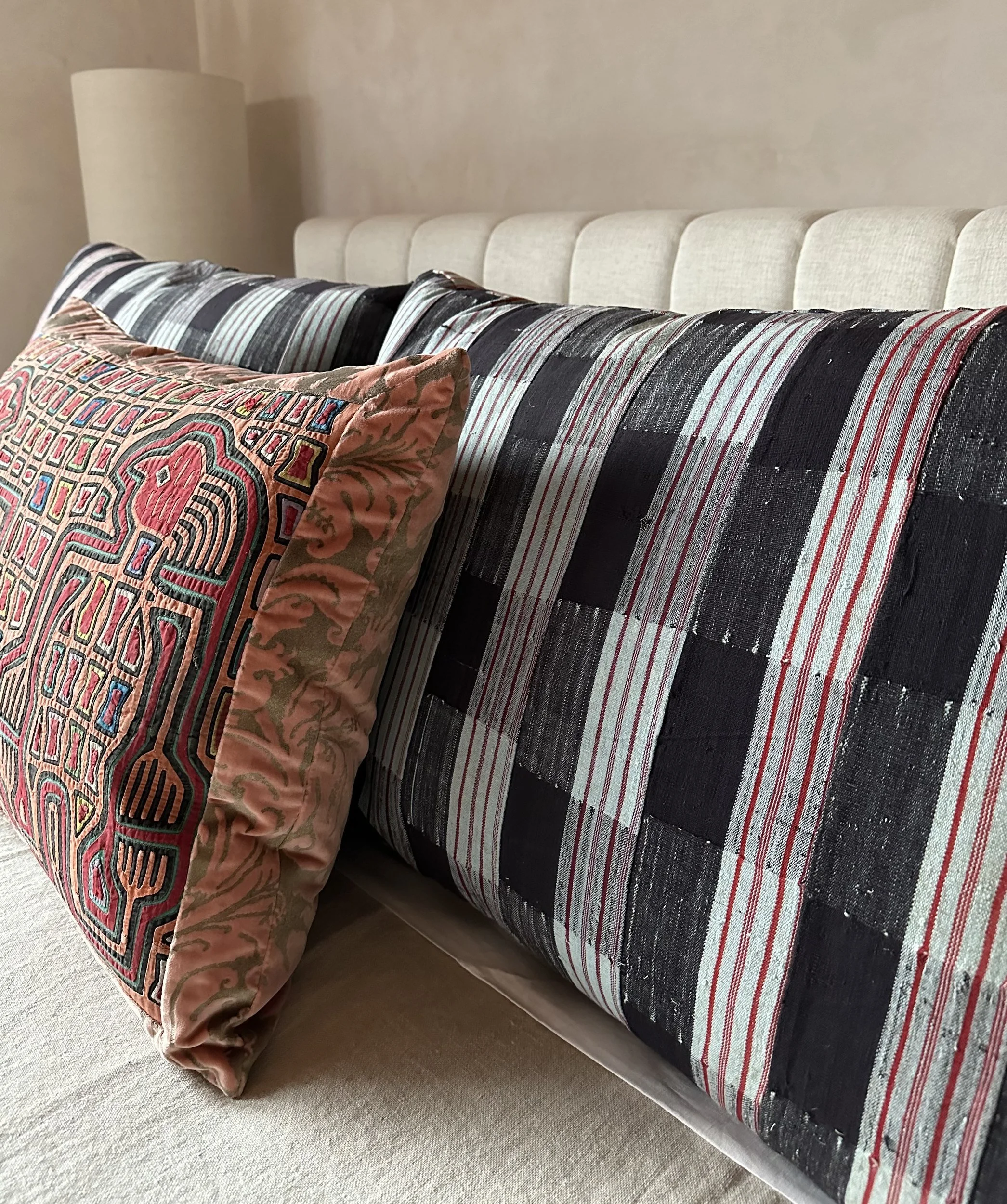 odds-and-ends-15-mola-and-striped-pillows.jpg