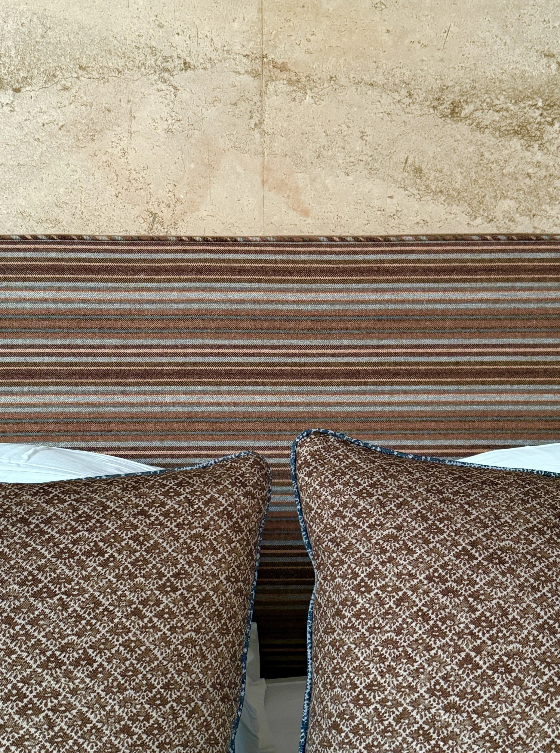 high-desert-05-headboard-travertine-detail.jpg