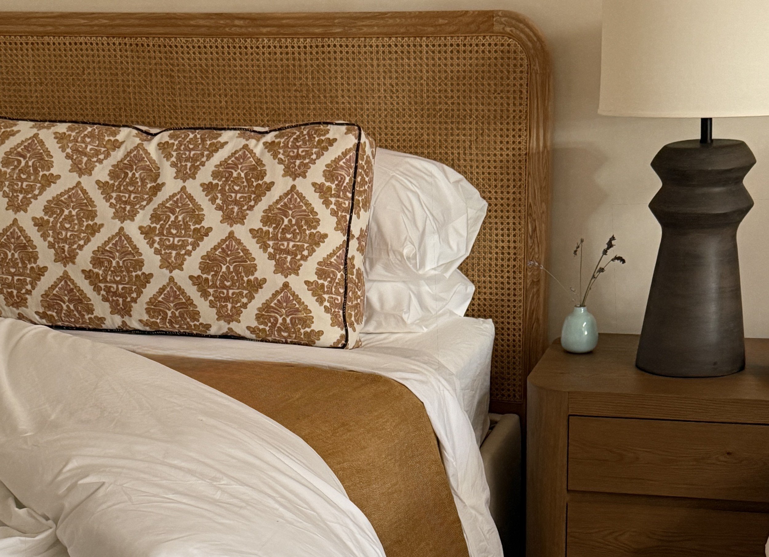 weekend-retreat-05-guest-bedroom-caned-headboard.jpg