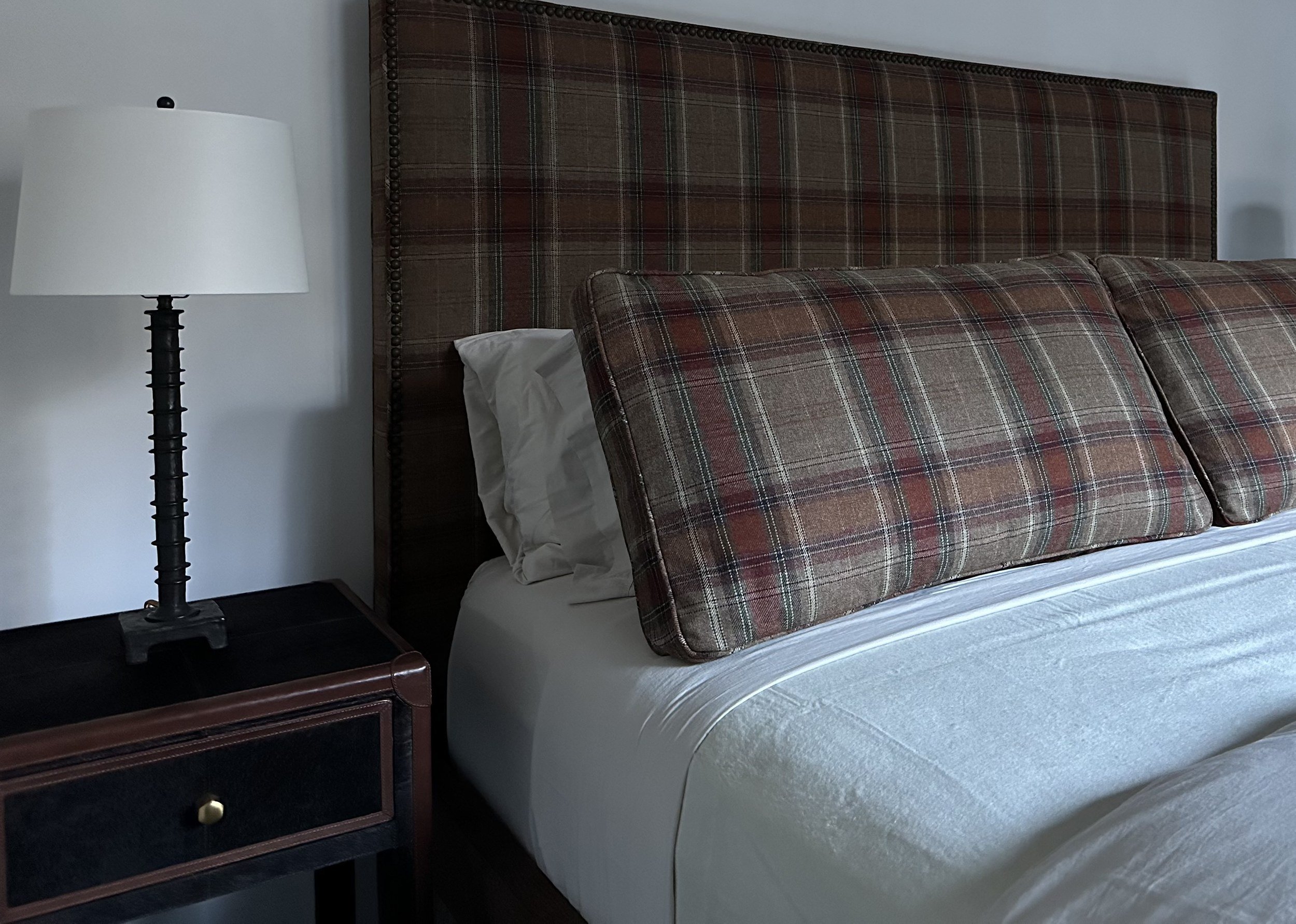 taos-ski-valley-cabin-1-07-guest-bedroom-plaid-headboard.jpg