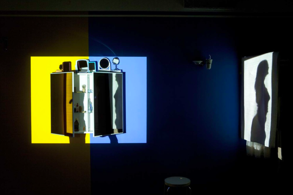 Mother and Father, 2012, light installation with domestic products and single channel video projection, 8', 8 x 2 x 2 m, edition of 3+1 AP