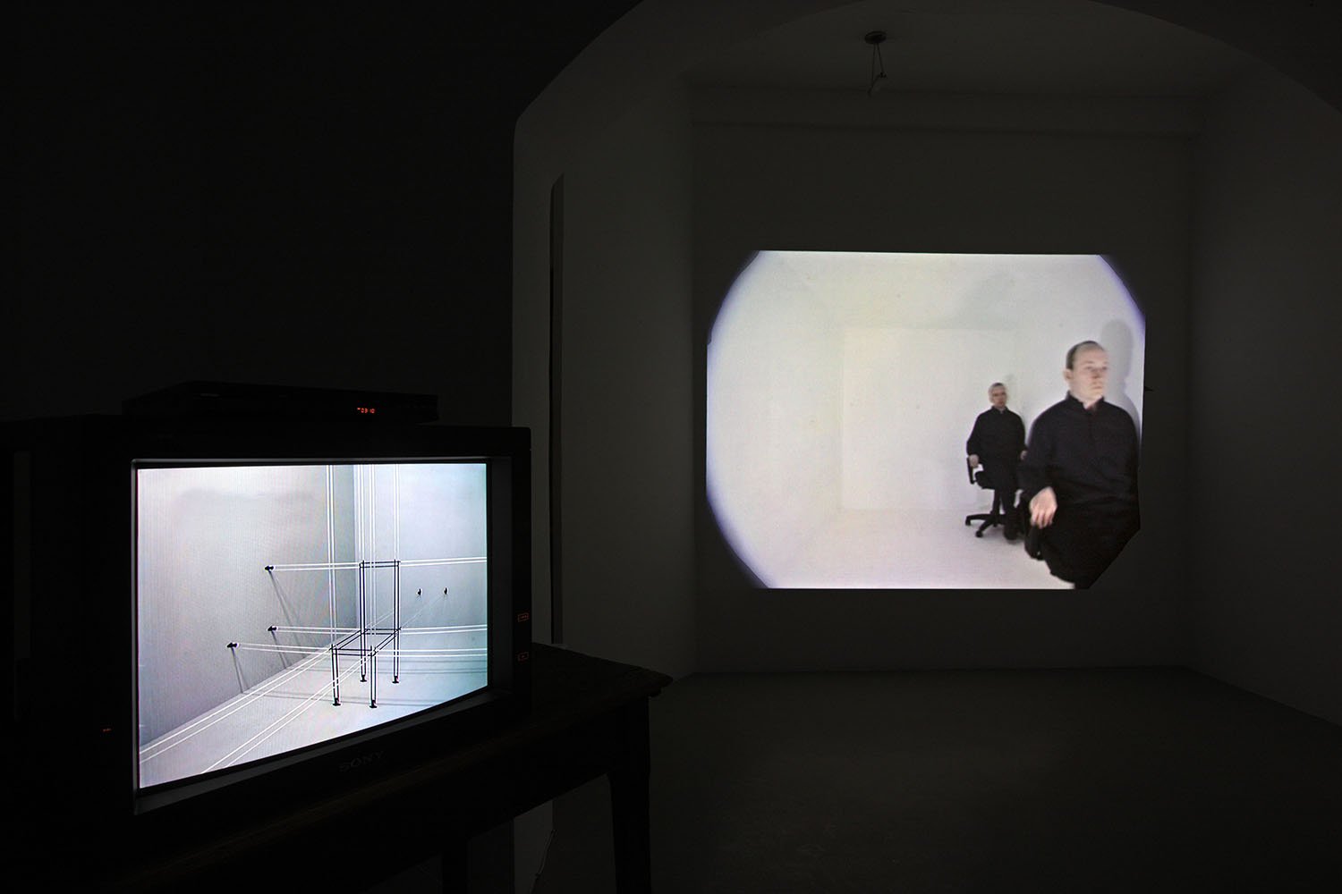Twenty Six (Drawing and Falling Things), Table and Chairs, 2001, video installation