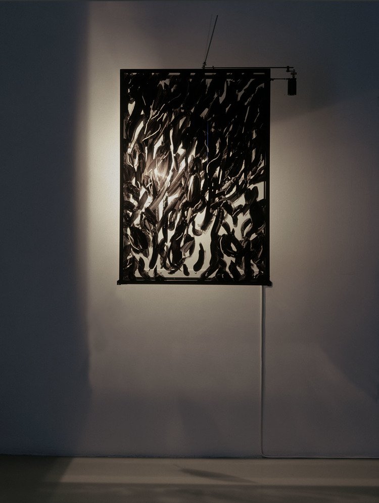 4. Fiamme di piume, 2003, paint on glass, feathers, light bulb, mechanical device, 102 x 72,5 cm.jpg