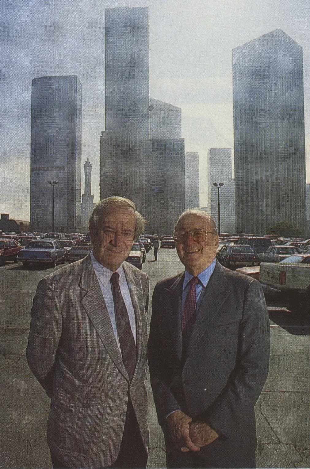 Philharmonic Executive Director Ernest Fleischman (left) and Walt Disney Concert Hall Committee Chairman Frederick M. Nicholas take stock of the Lot K car park that will soon give way to Disney Hall