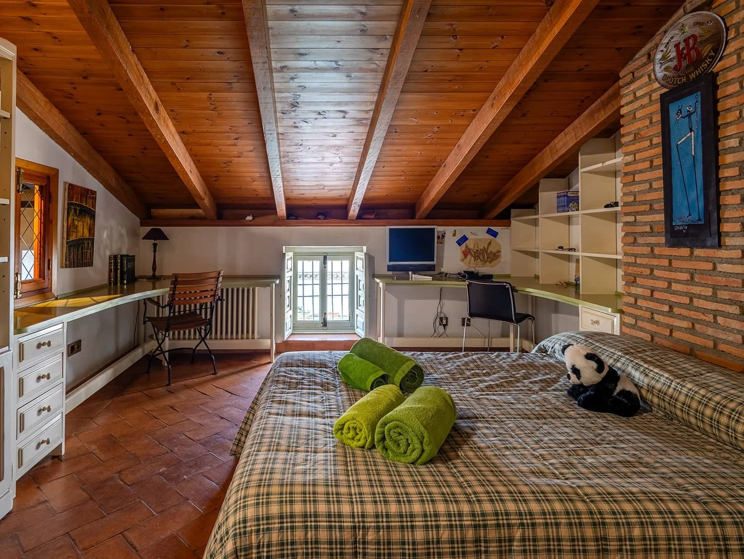 Dormitorio con decoración rústica – Casa Rural Almagro