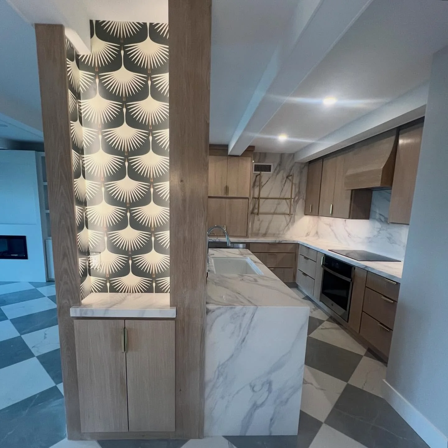 &ldquo;No, Jill, we can&rsquo;t take that wall down&rdquo;&hellip;. 
&ldquo;Okay, fine, I&rsquo;ll add it into the design and give you something functional and pretty!&rdquo; (Waiting for glass display shelves to arrive!😉)

Working in condos often m