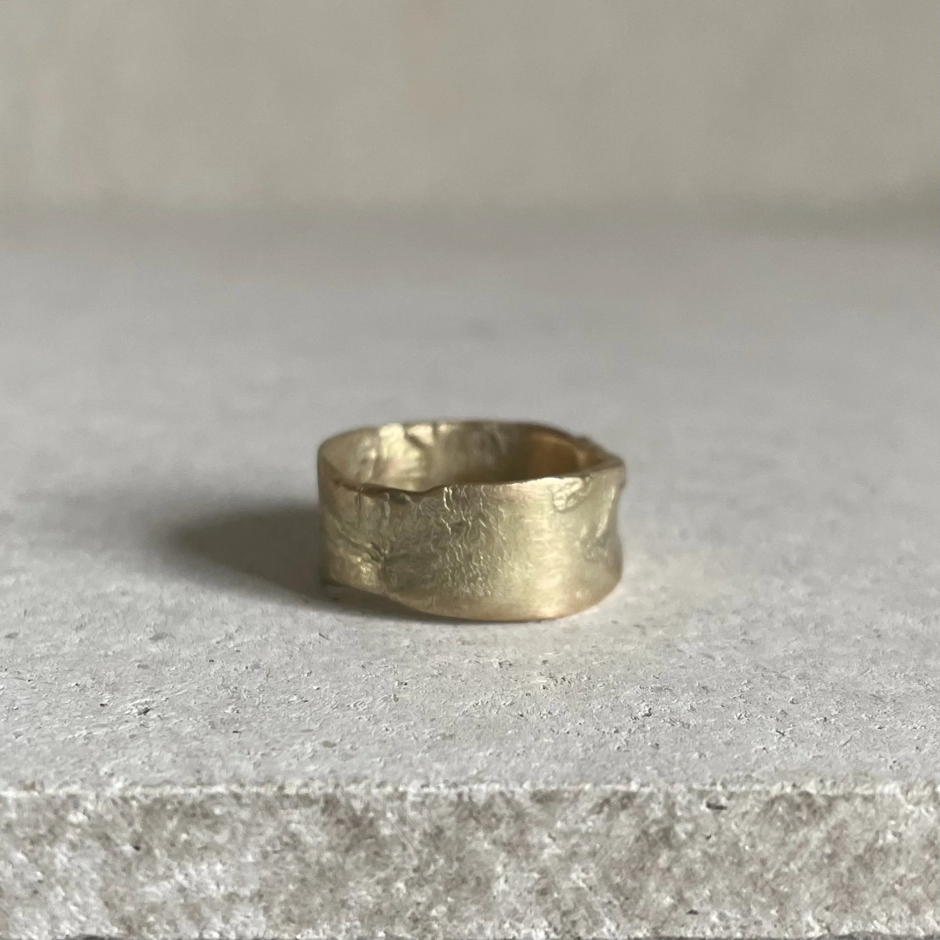 Melted ring in solid recycled gold