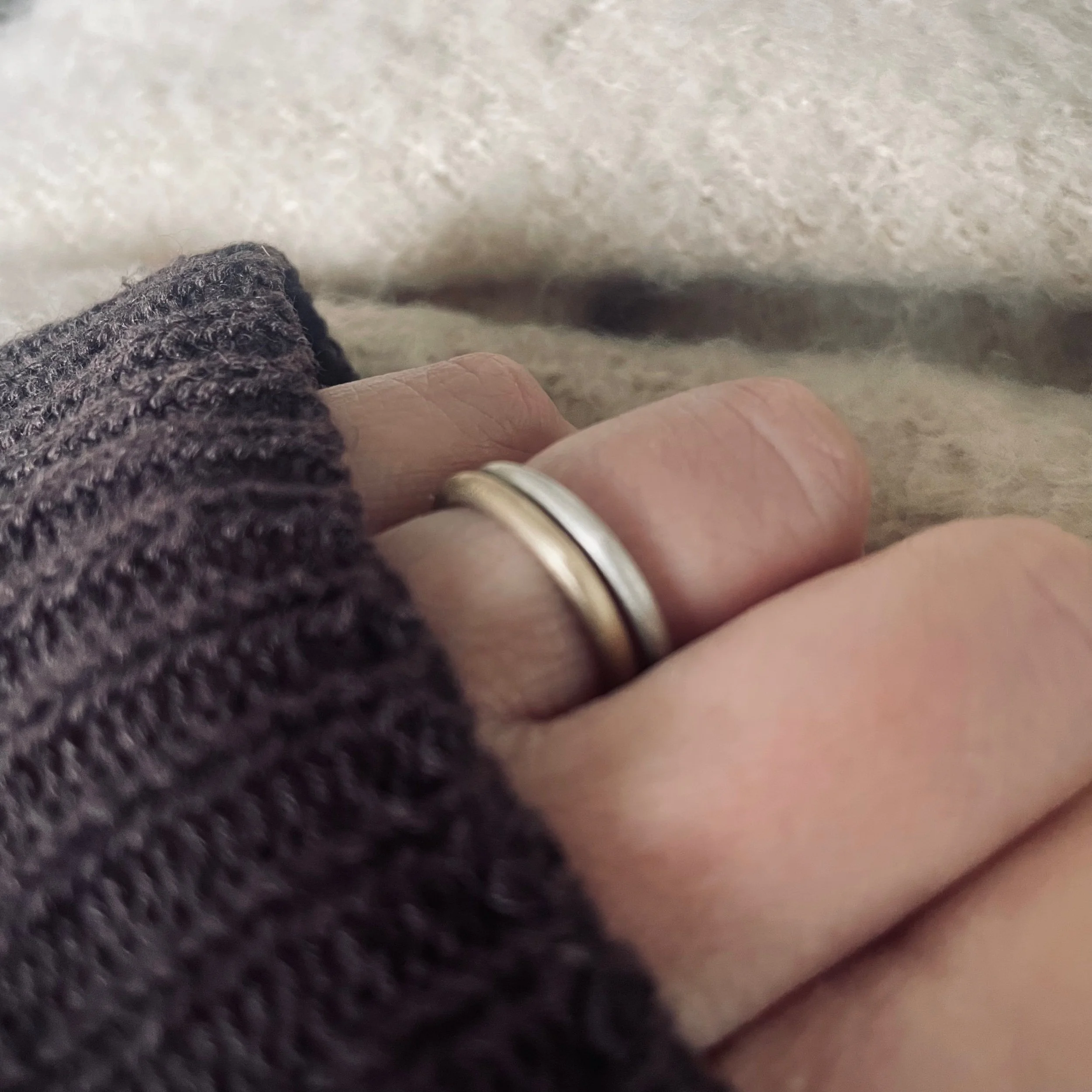 Handmade solid recycled gold ring phtographed worn