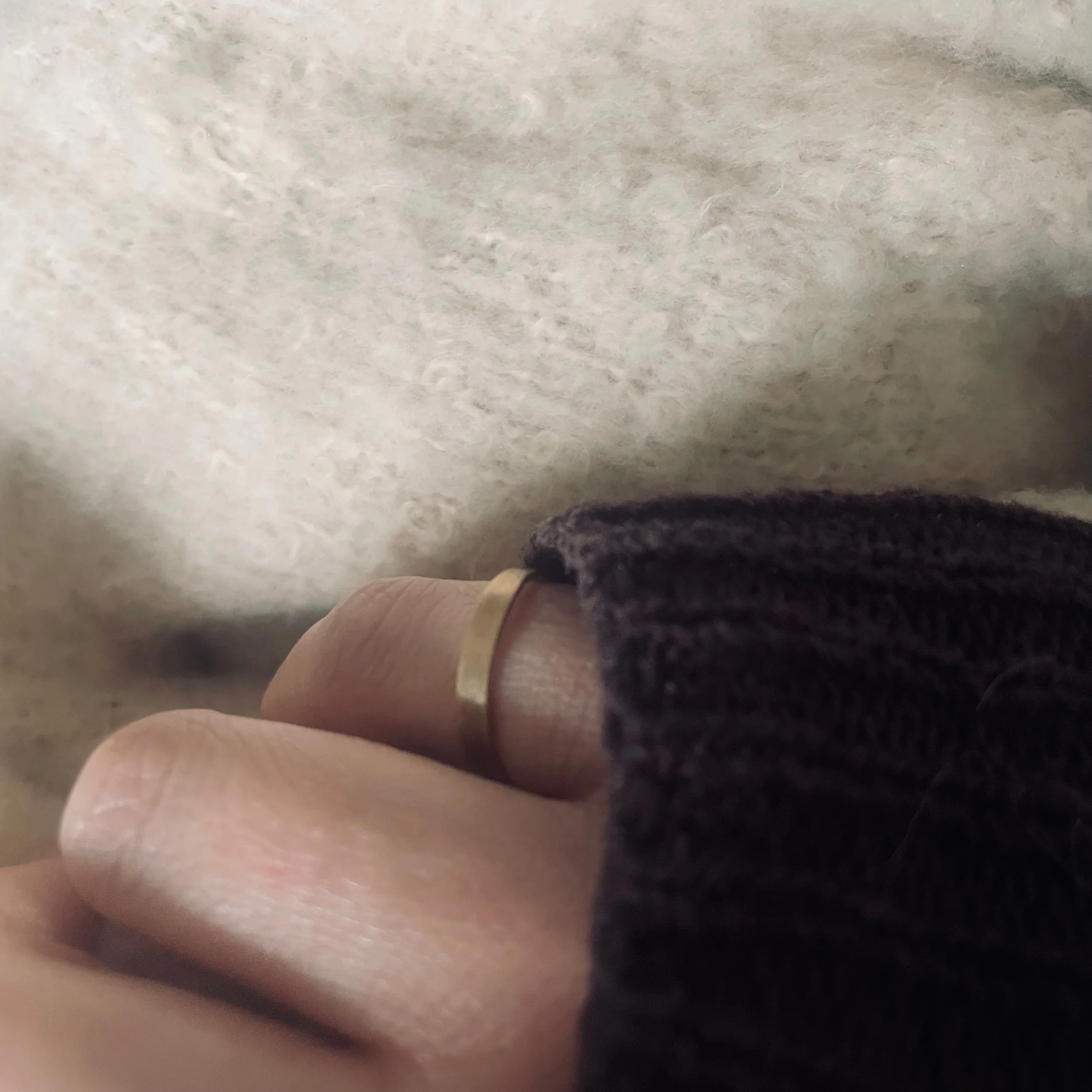 Handmade milled solid recycled gold ring photographed worn