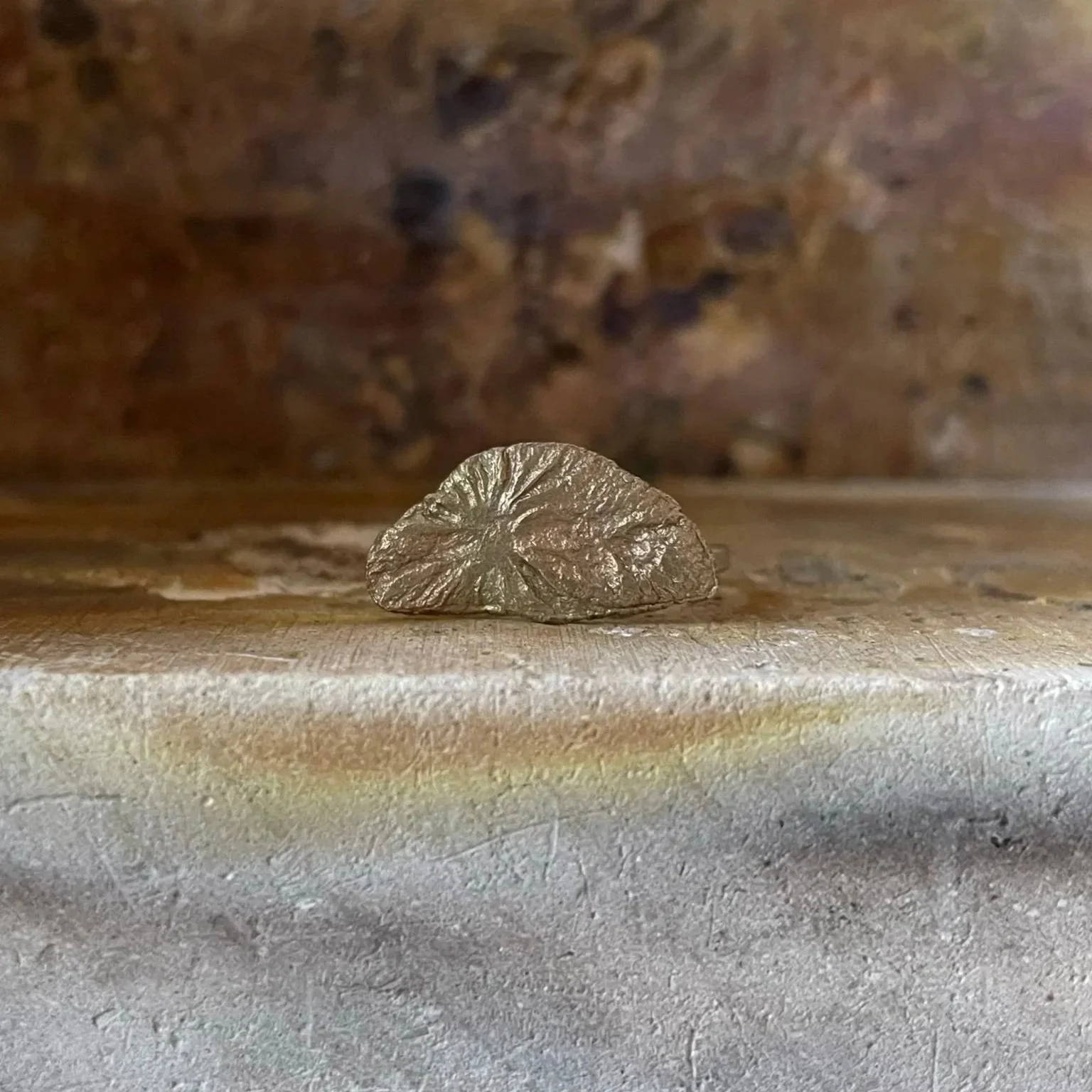 Part-melted sunrise/sunset ring in solid recycled gold
