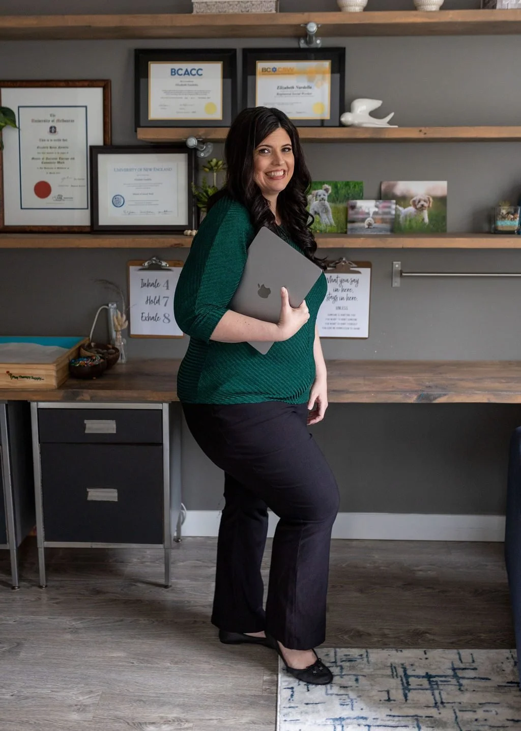 Elizabeth Nardella, RSW, RCC, in her South Surrey counselling office with her framed credentials behind her