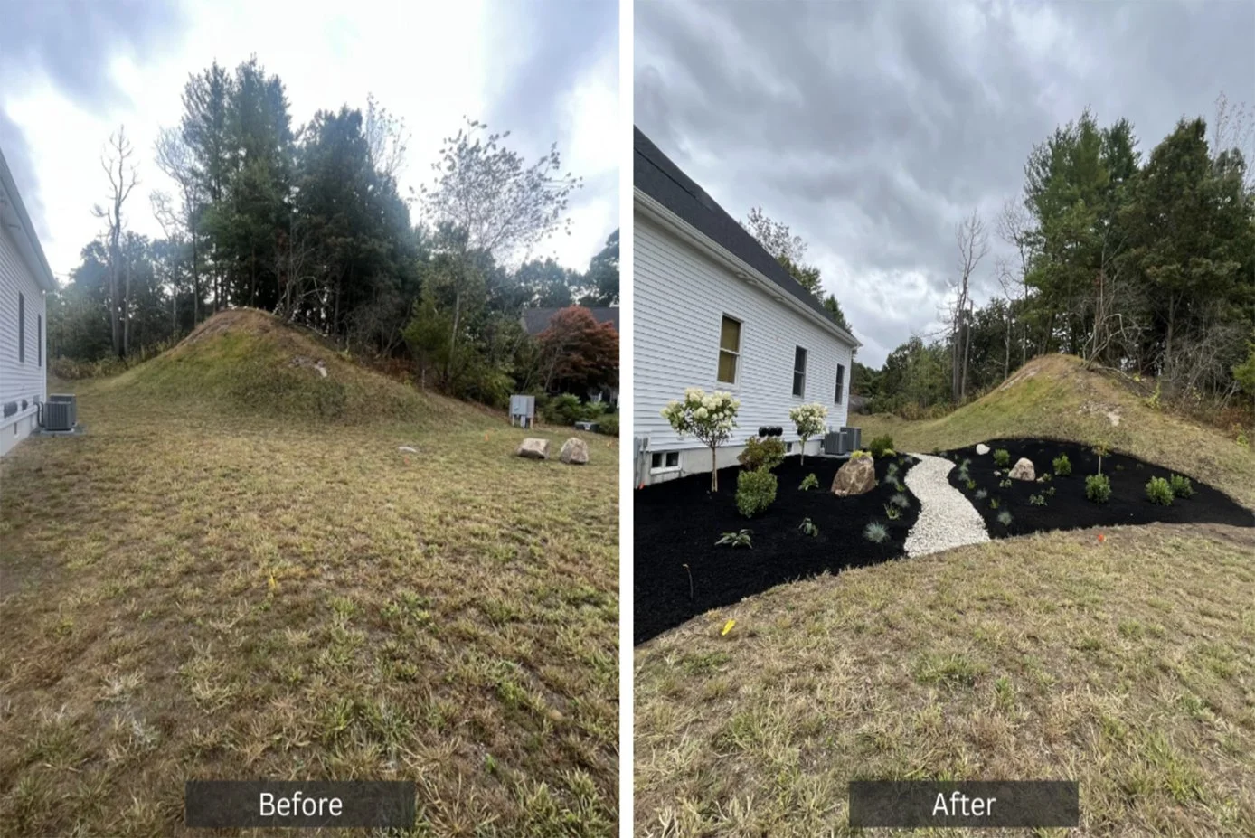 Side-by-side comparison of a backyard before and after landscaping. The left shows a sloped grassy area with patches of bare ground. The right shows the same area with a black mulch bed, small shrubs, decorative rocks, and a white gravel pathway, along with some small white flowering trees, under a cloudy sky.