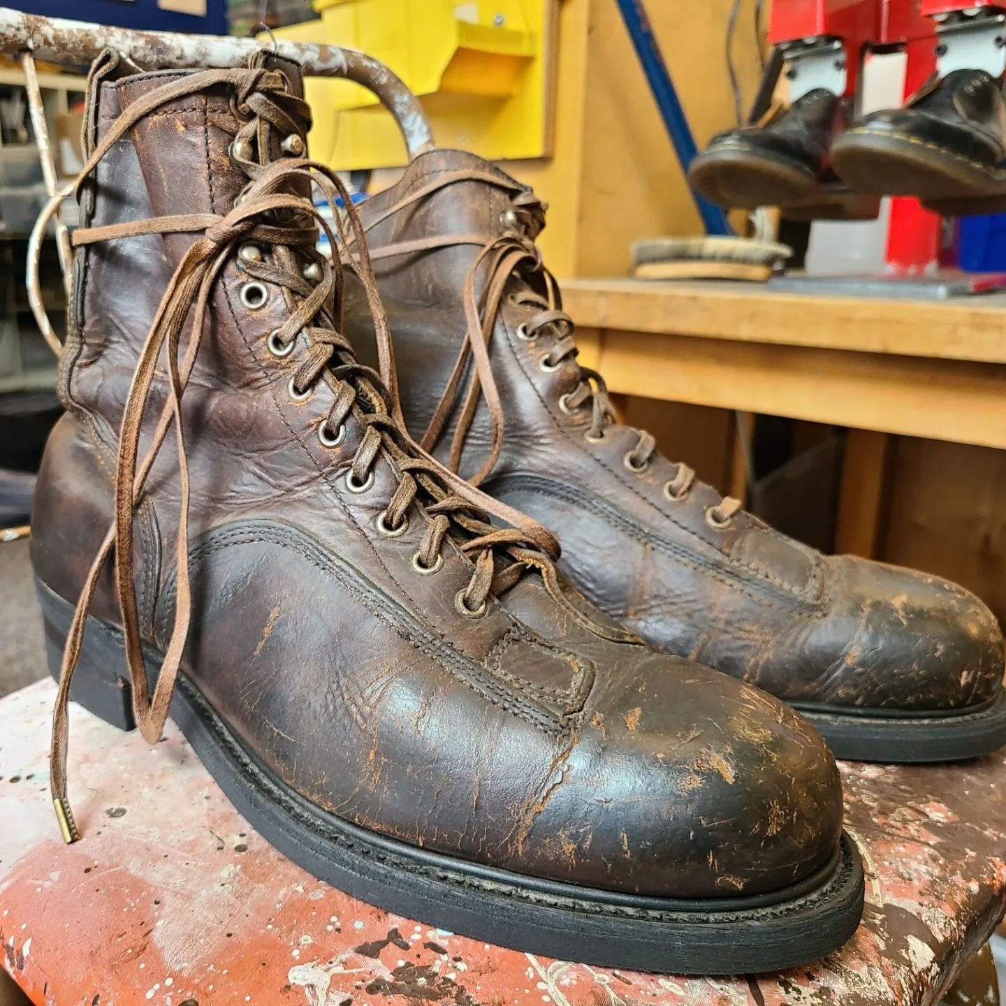 Really cool pair of Vintage boots. 
Rebuilt with a pair of Vibram 700 &quot;v-bar&quot; Fullsoles and Heels. These soles are oil resistant and offer really decent wear. The customer requested not to wipe off the dirt and grime, and I have to say, it 