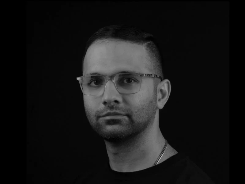 DR. ABBAS HASSANALI.jpeg