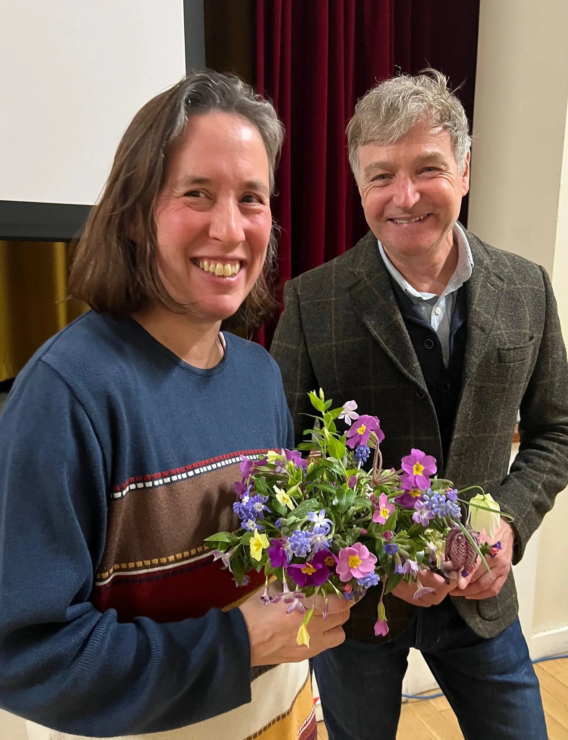 Chris Beardshaw presents Kim Head with the 2nd Prize in the Vase of Spring Flowers Competition.