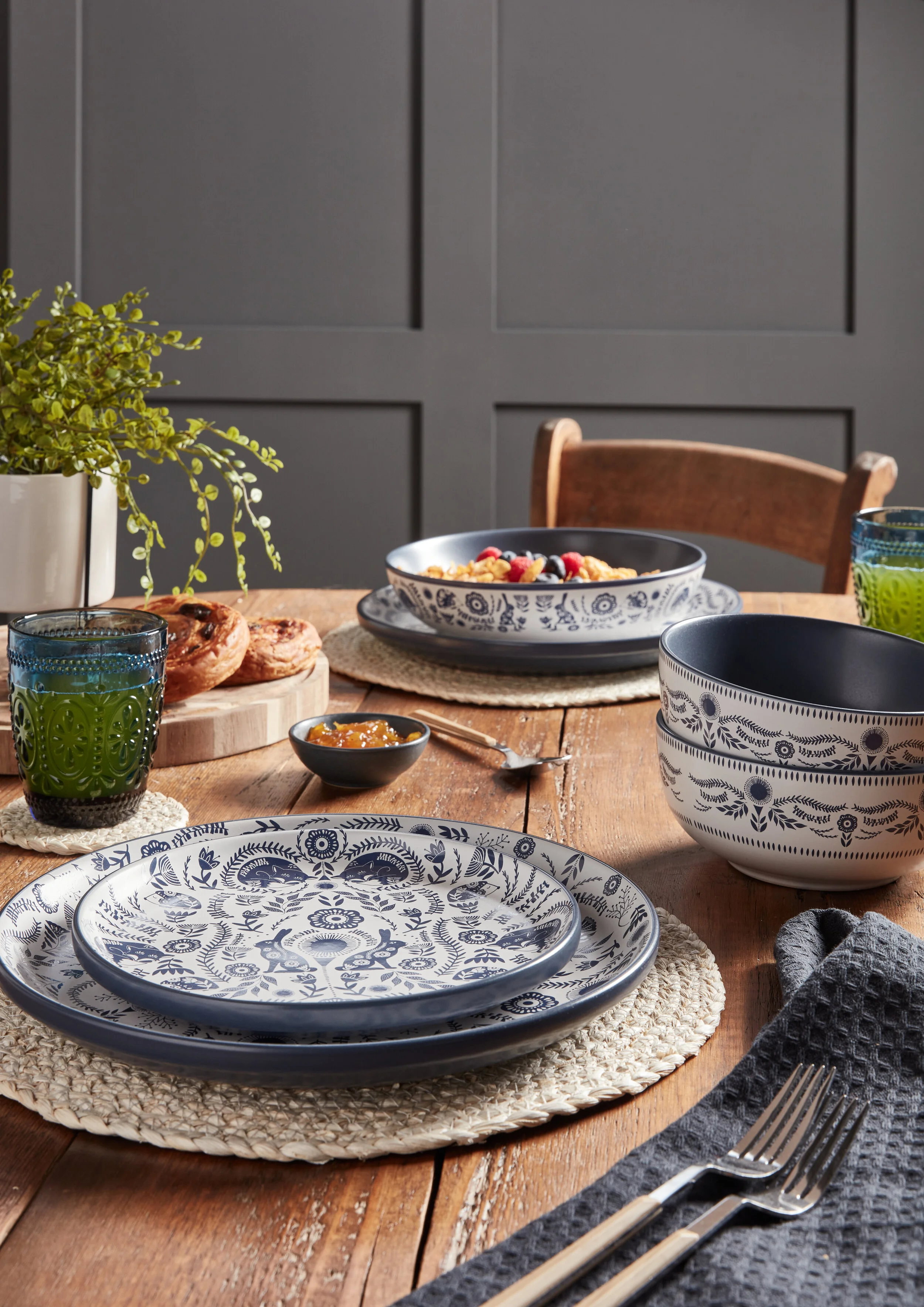 Dining room table - styled for photography. Staging a property for marketing or for sale. Achieve a higher rental or price by investing in interior design.