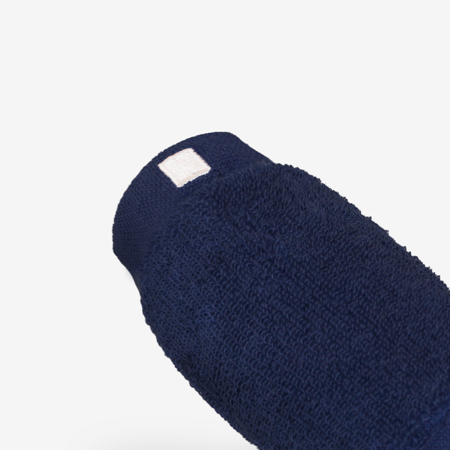 Sweatband-Navy-Angle-CU.jpg